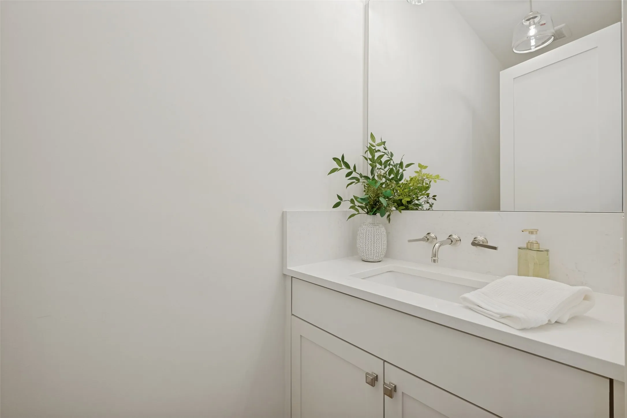 Conveniently located on the second floor, this powder bath provides easy access for guests and residents alike.