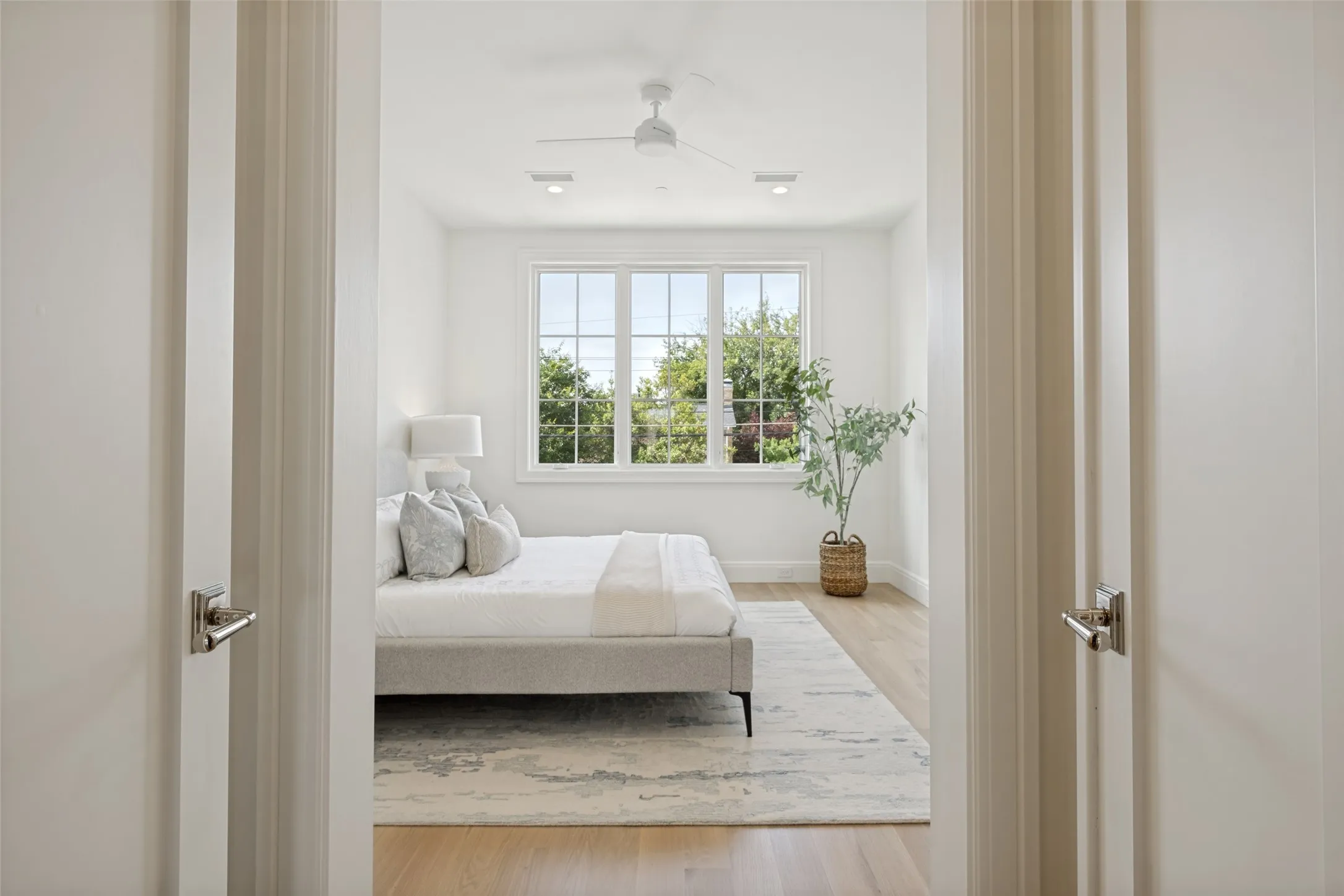 Primary suite featuring private double French door entry, located on the second floor.