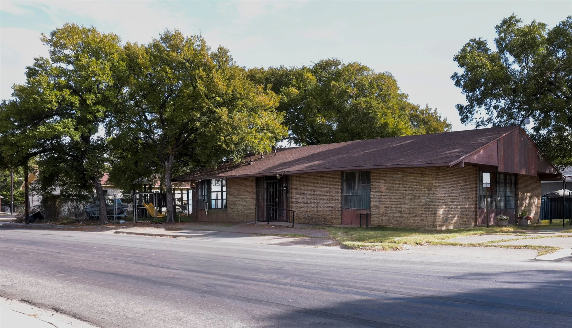 Brick exterior with mature trees