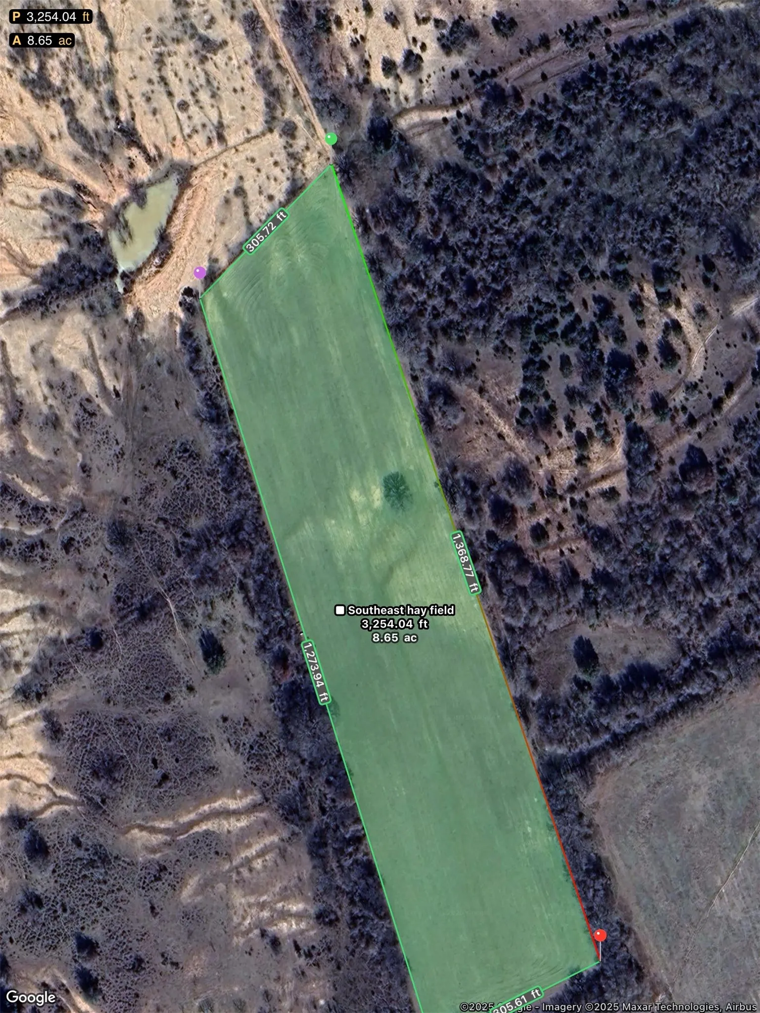 Second of two fenced hay fields, approximate acreage 8.65 acres. Buyer and Buyer's agent to verify all measurements for accuracy.  Refer back to the survey in documents dated June 6, 2025.