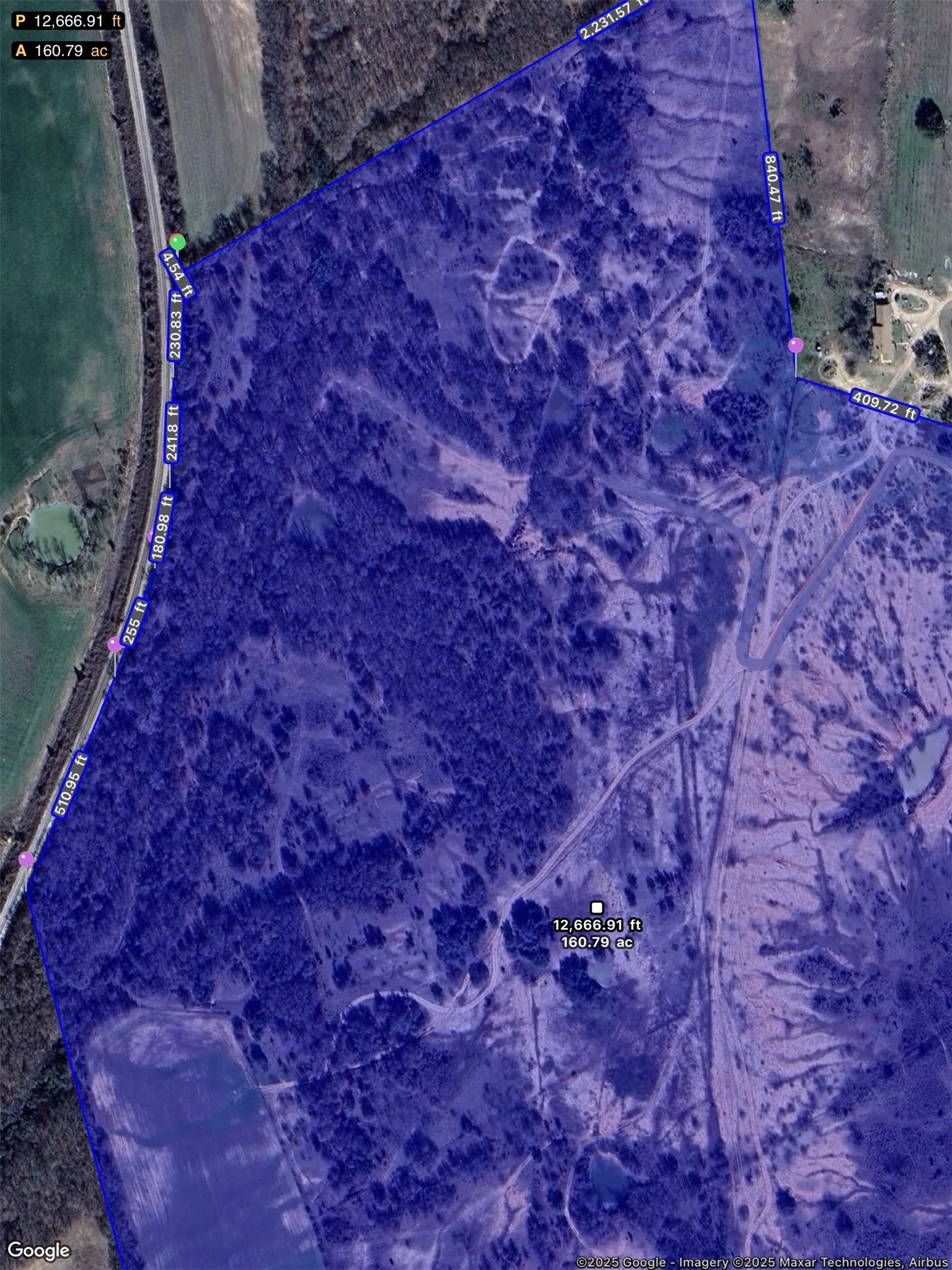 Aerial view of property.  The left-hand side of the photo backs to the railroad tracks.  The upper right-hand side of the photo is the CR 298 entrance with 150.46' frontage on CR 298.  Buyer and Buyer's agent to verify all measurements for accuracy, this is an estimation only.  Refer back to the survey in documents dated June 6, 2025.