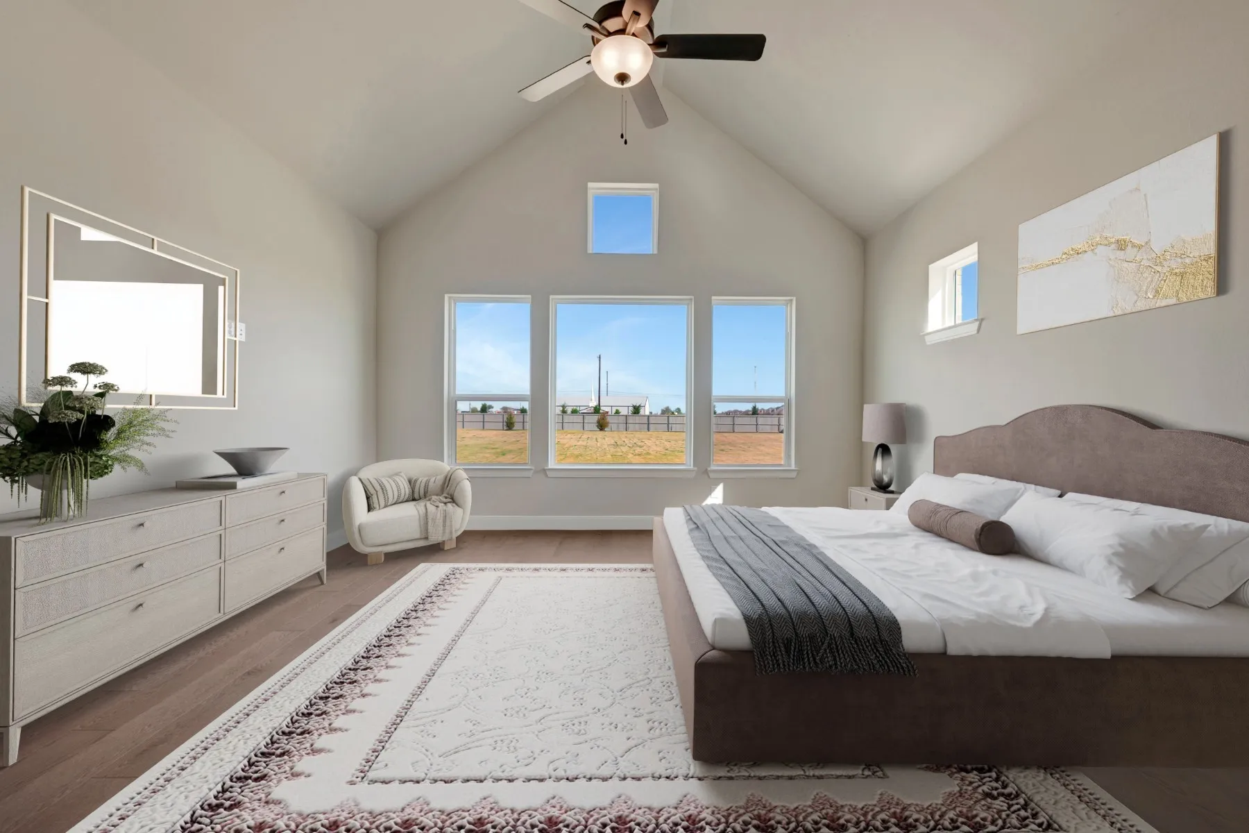 Bedroom with a ceiling fan, a high ceiling, and wood finished floors