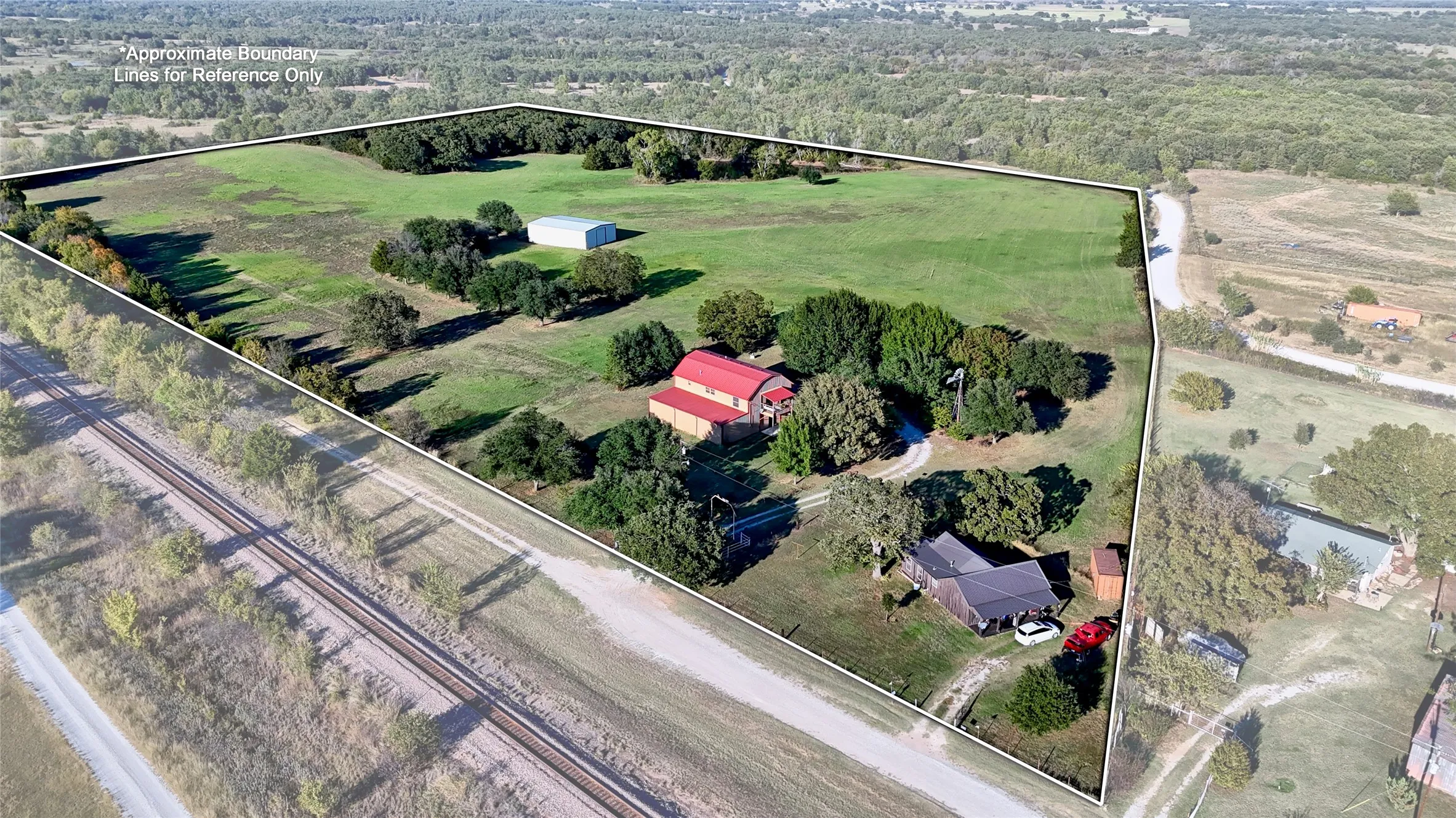 Aerial overview of property's location featuring rural landscape and property parcel outlined