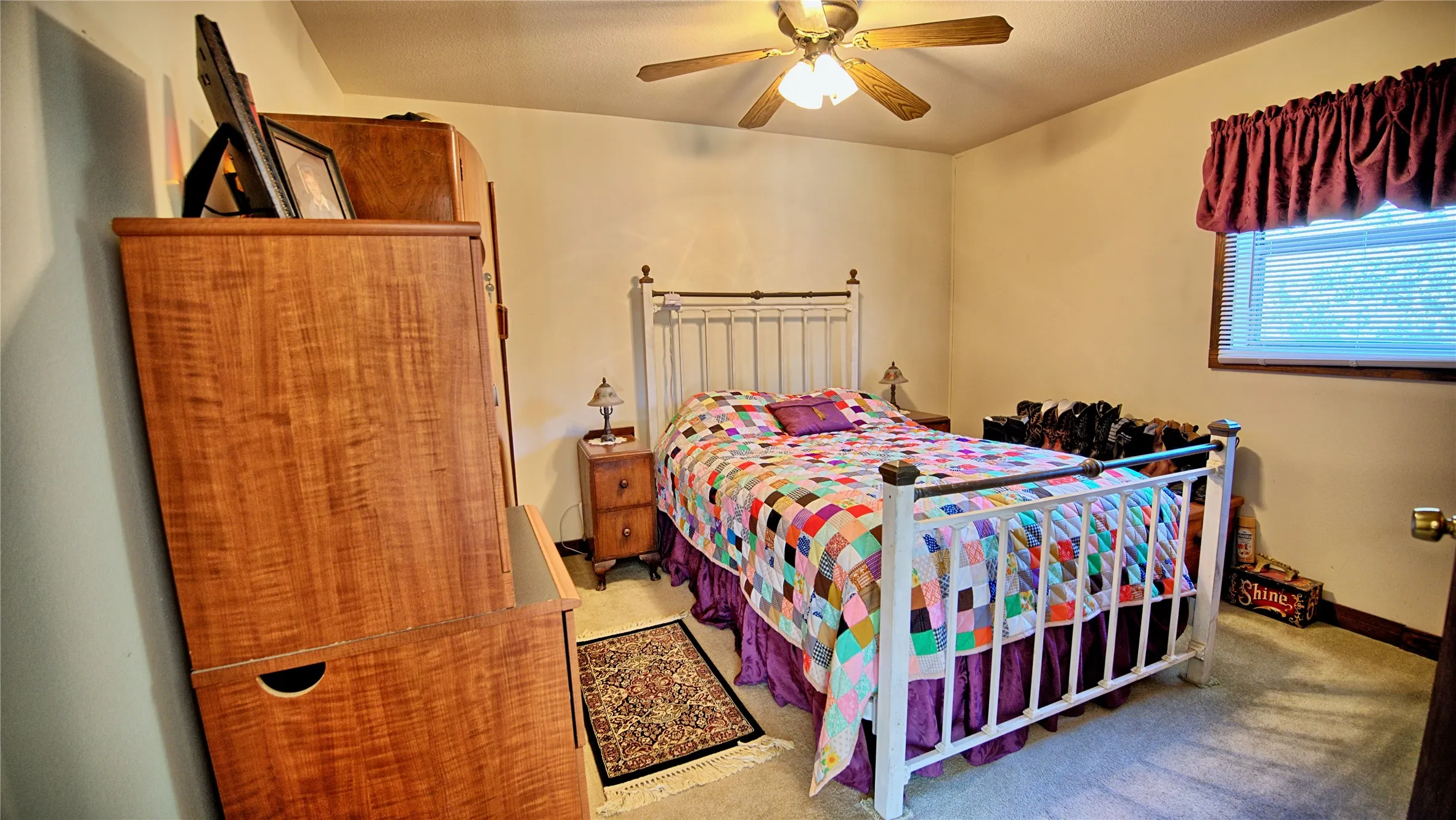 Bedroom featuring carpet floors and ceiling fan