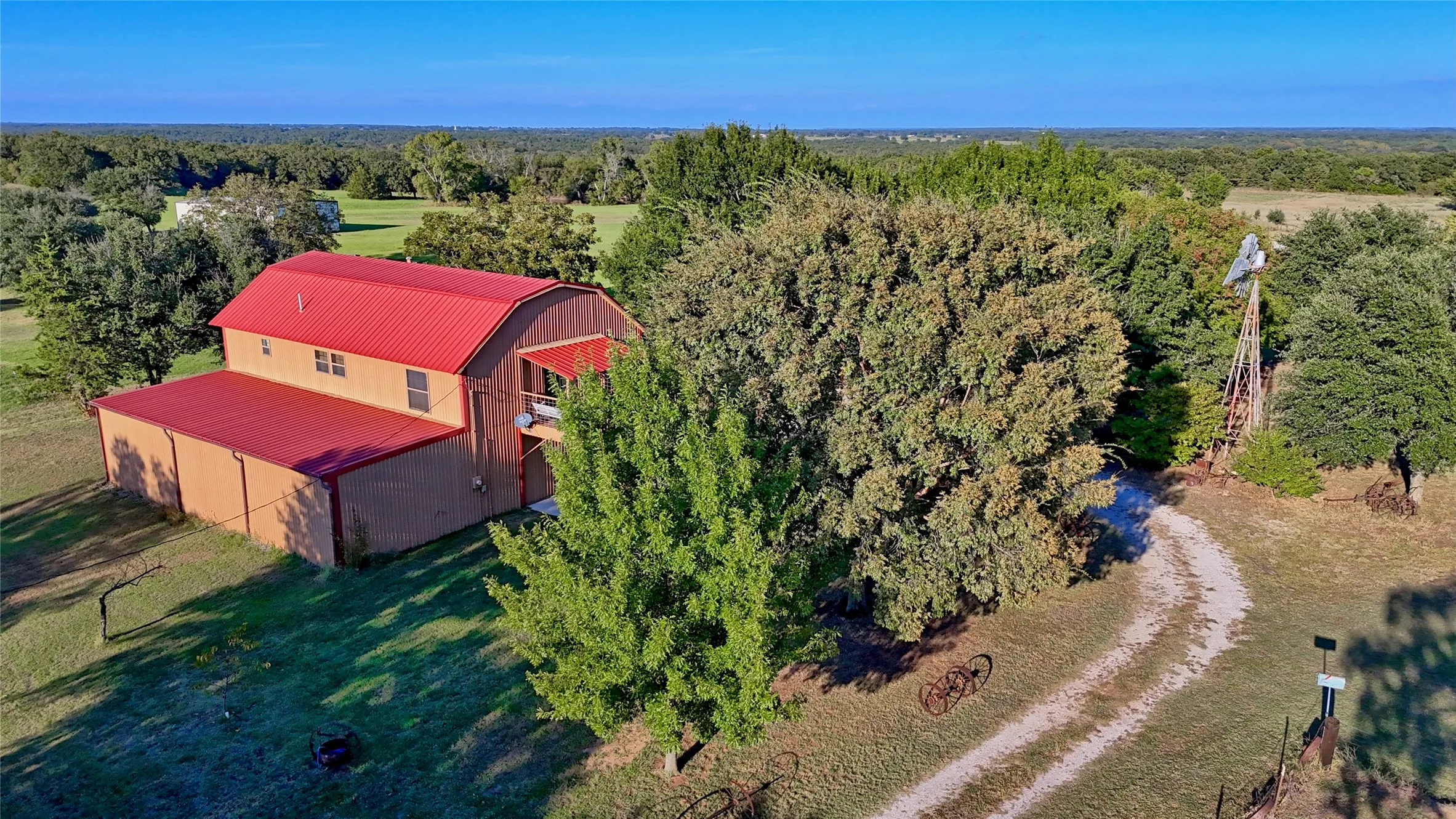 View from above of property featuring a forest