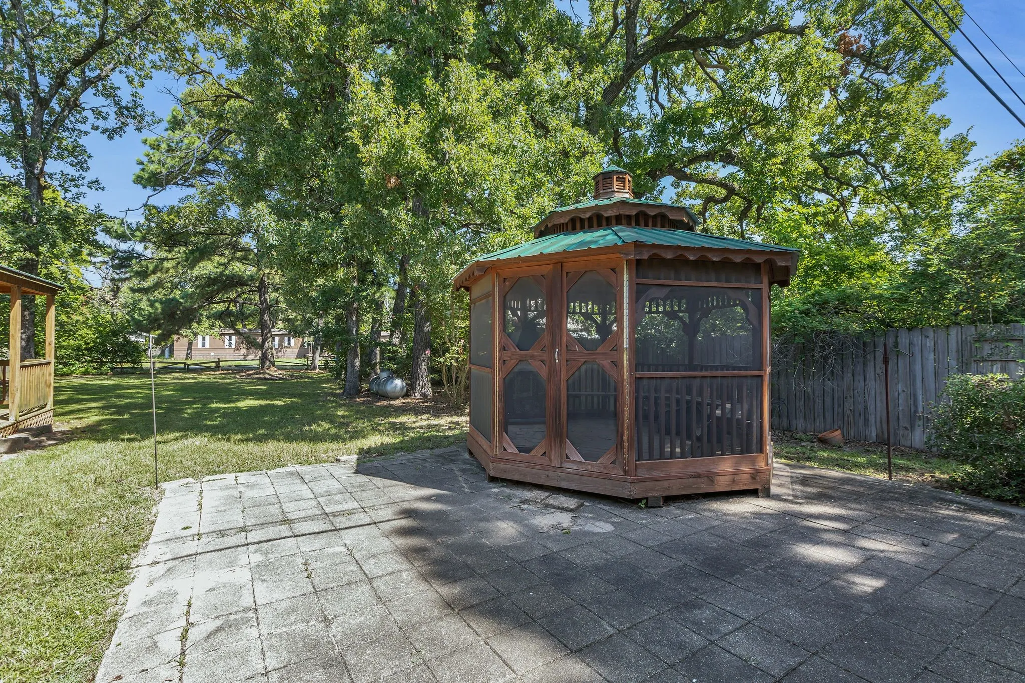 Backyard with gazebo, outdoor gas fireplace
