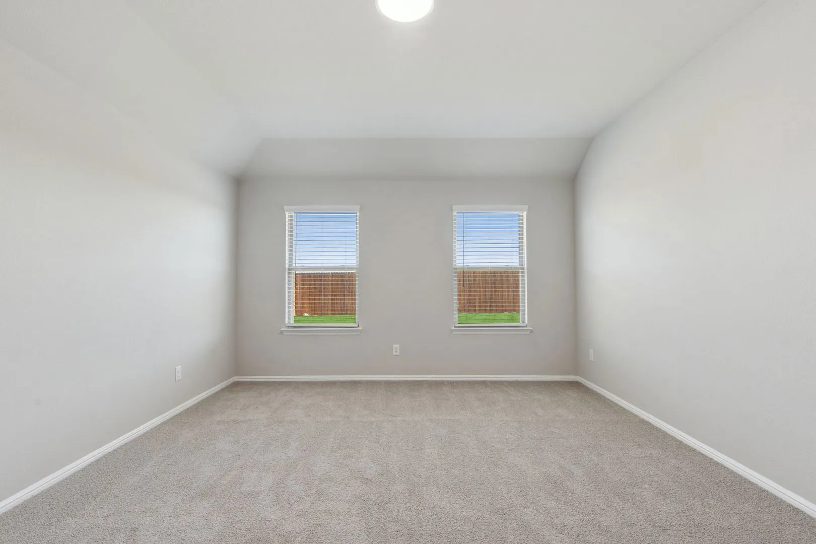 Primary Suite in the Harrison home plan by Trophy Signature Homes – REPRESENTATIVE PHOTO