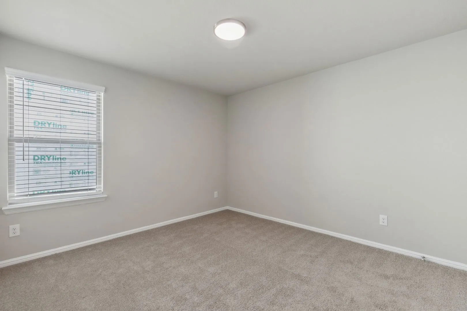 Bedroom in the Harrison home plan by Trophy Signature Homes – REPRESENTATIVE PHOTO