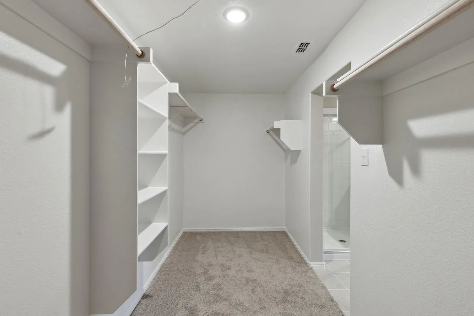 Primary Closet in the Harrison home plan by Trophy Signature Homes – REPRESENTATIVE PHOTO