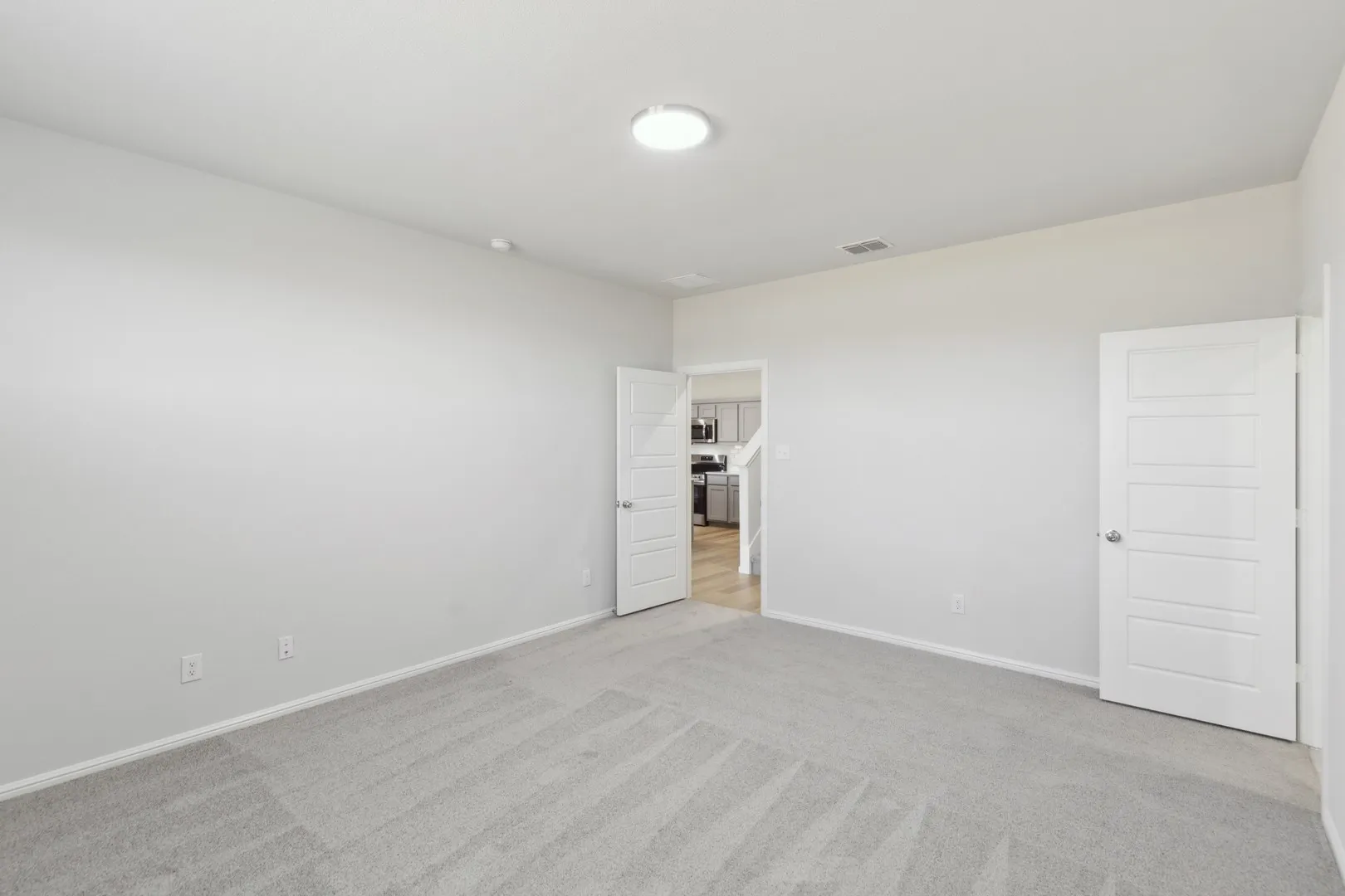 Primary Suite in the Holden home plan by Trophy Signature Homes – REPRESENTATIVE PHOTO