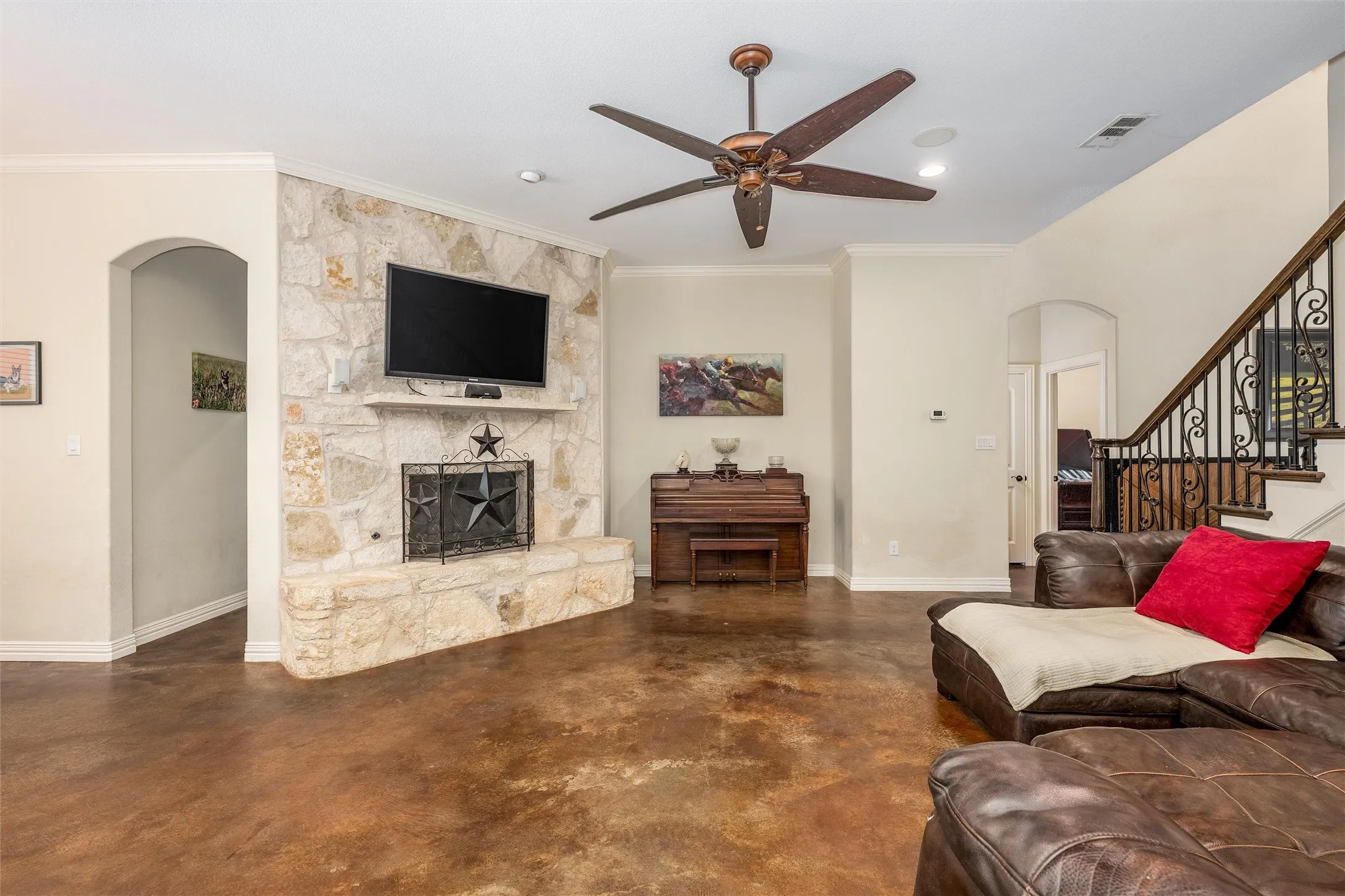 Floor to ceiling stone fire place