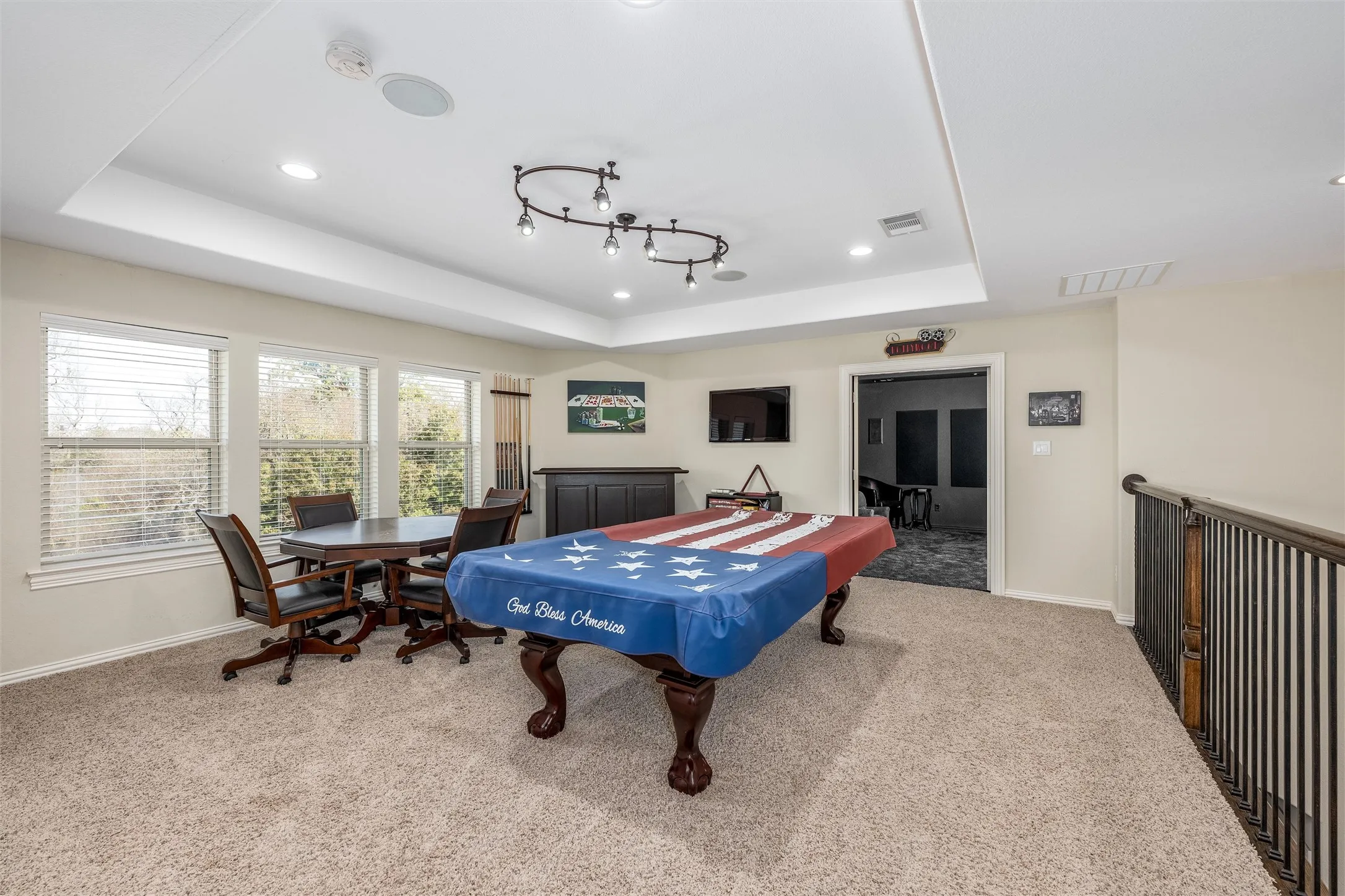Rec room with light carpet, a raised ceiling, recessed lighting, and billiards