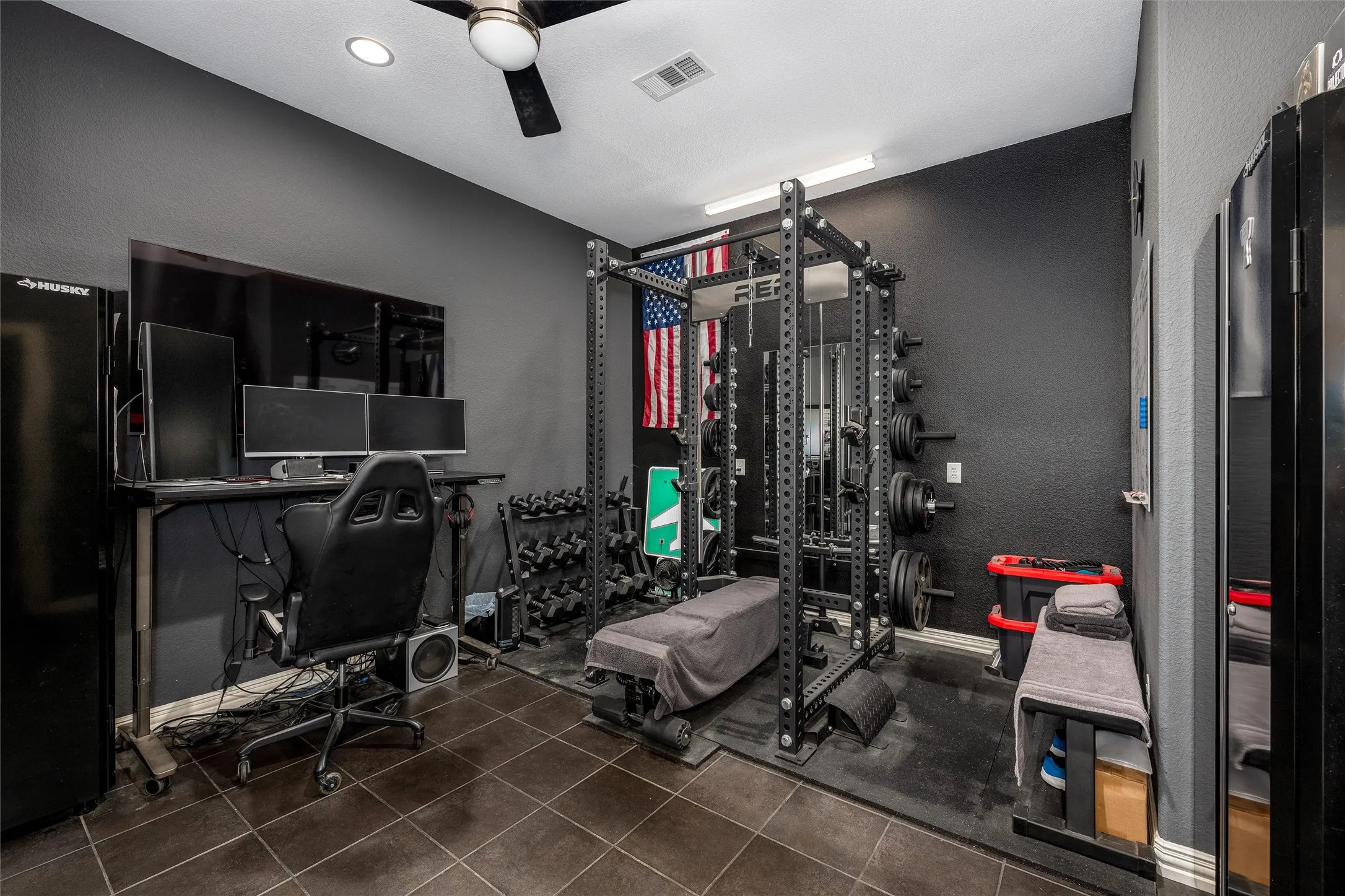 Exercise room or office, tile flooring, ceiling fan and recessed lighting