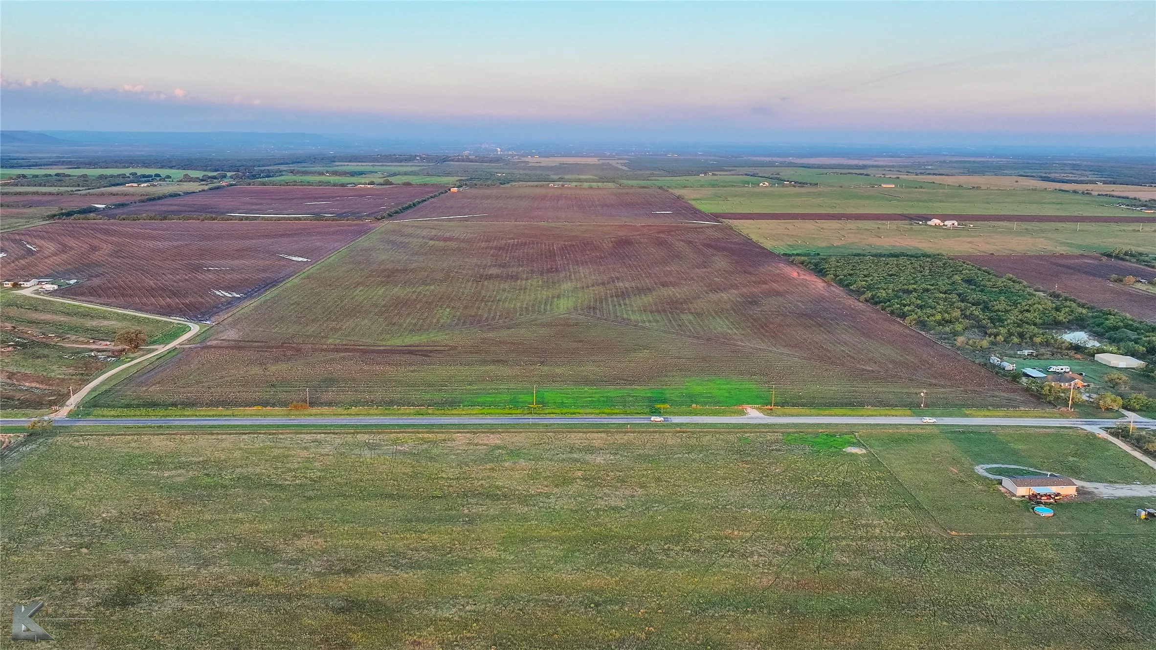 View of rural area with rows of crops