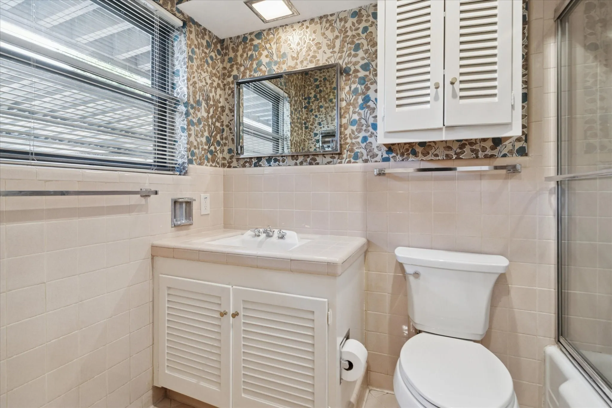 Bath with tub enclosure