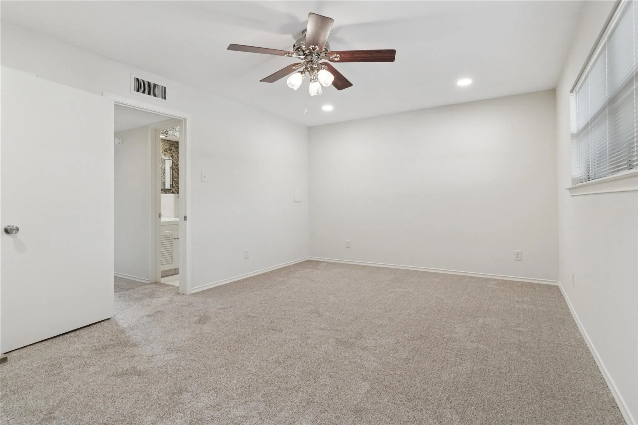 Spacious primary bedroom