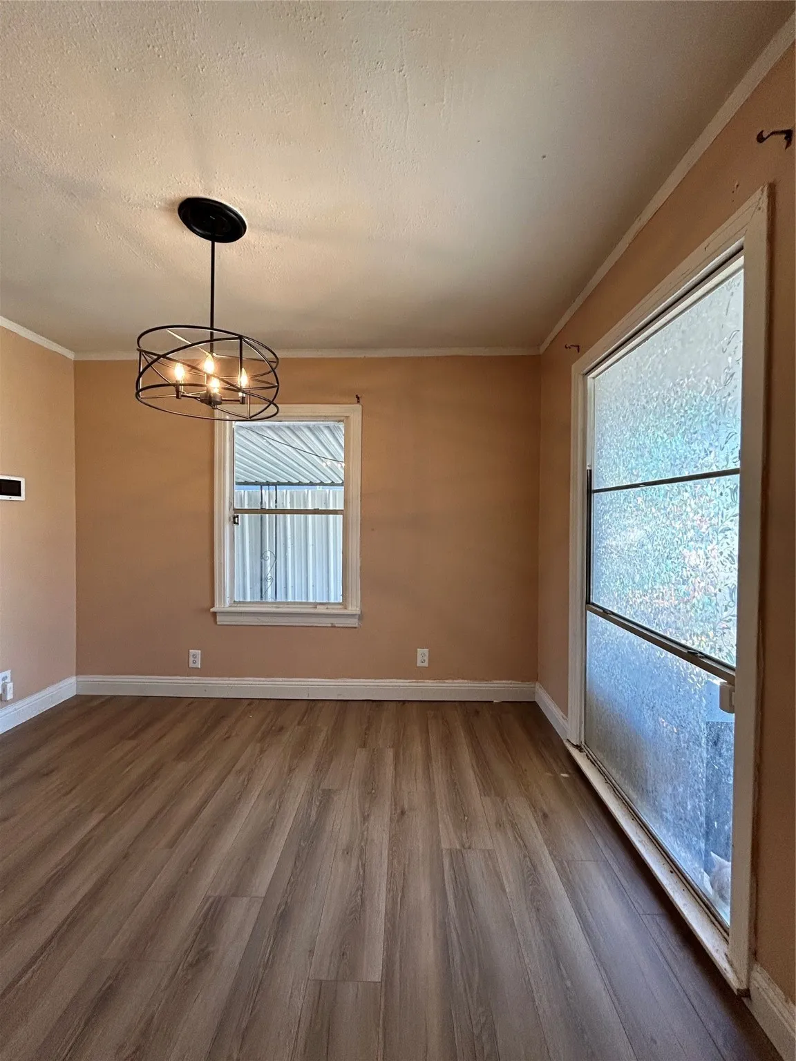 Unfurnished dining area featuring natural lighting.
