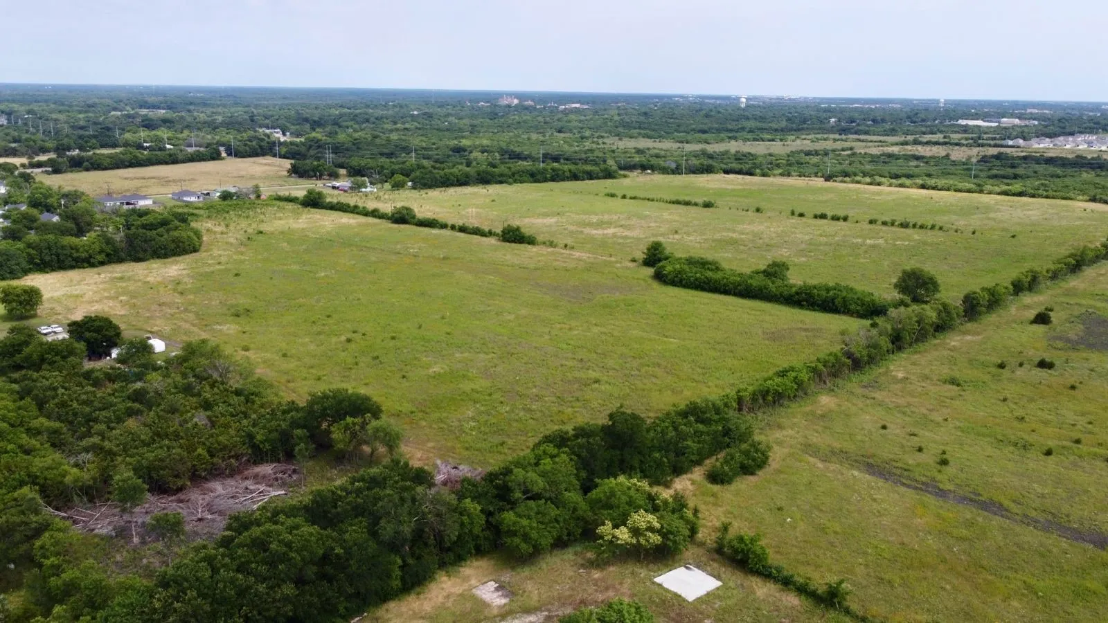 Aerial overview of property's location with rural landscape