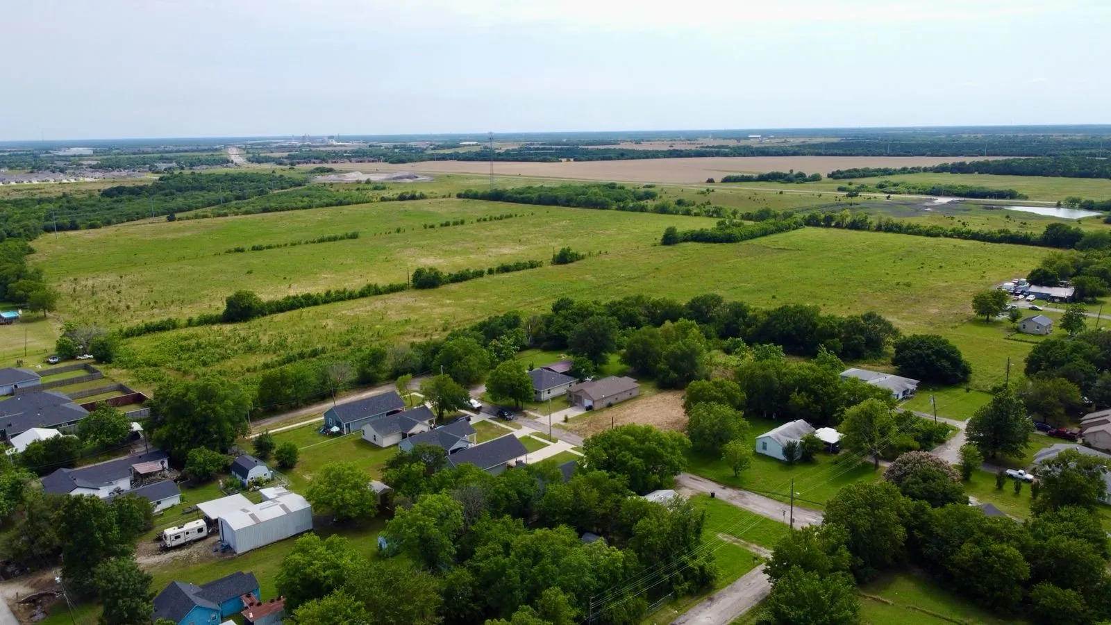 Aerial overview of property's location featuring rural landscape
