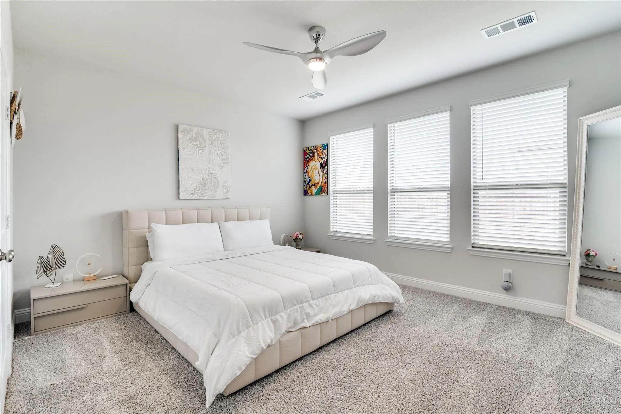 Bedroom featuring carpet floors and ceiling fan