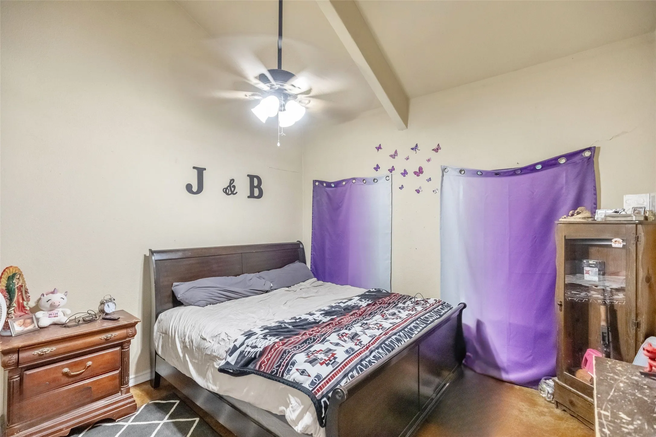 Primary Bedroom with two large windows