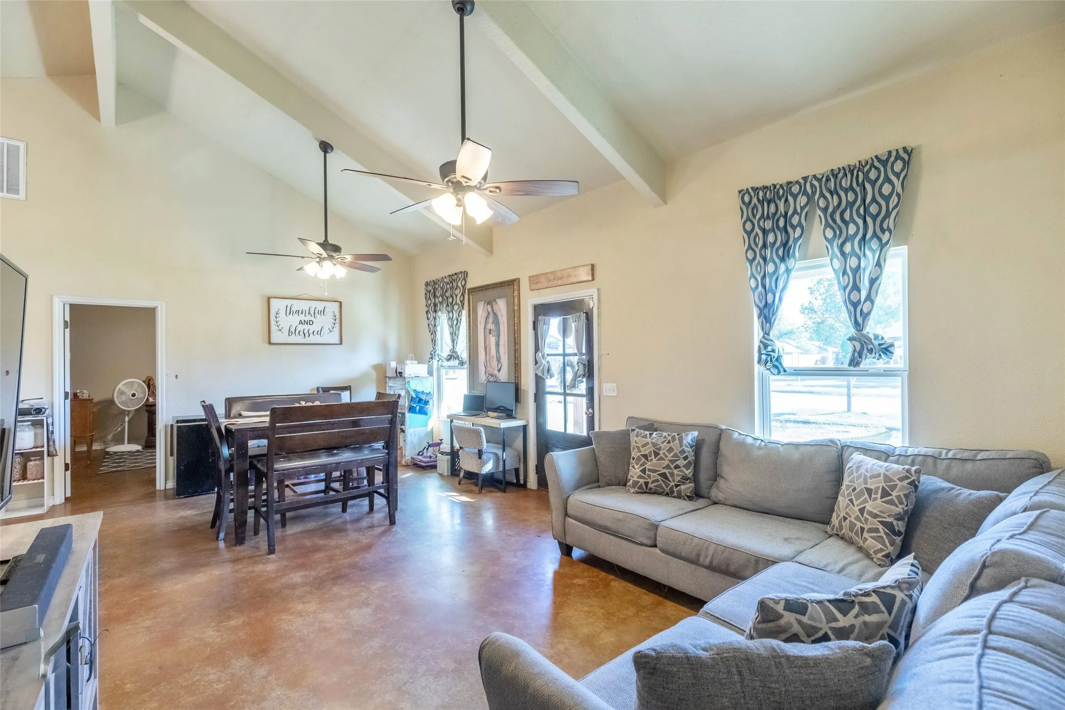 Double fan system in living room and dining area