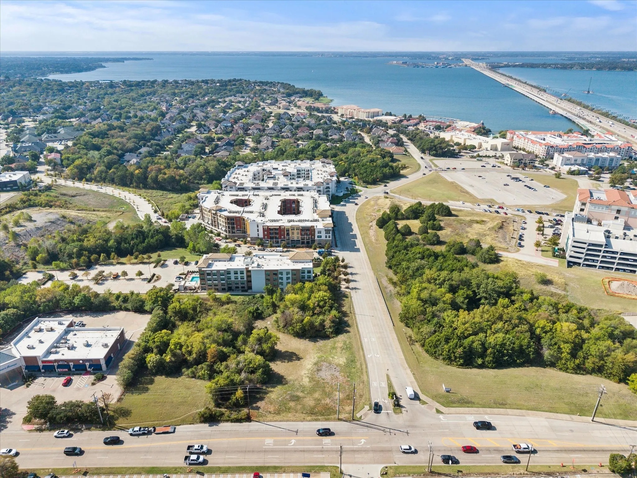 Aerial overview of property's location featuring a nearby body of water and a notable bridge