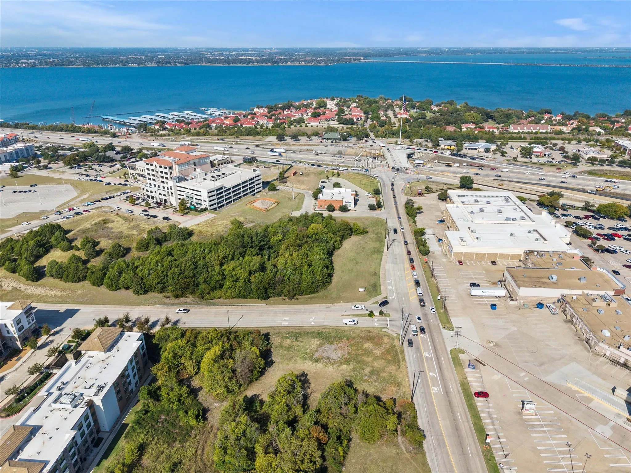 Aerial overview of property's location featuring a nearby body of water