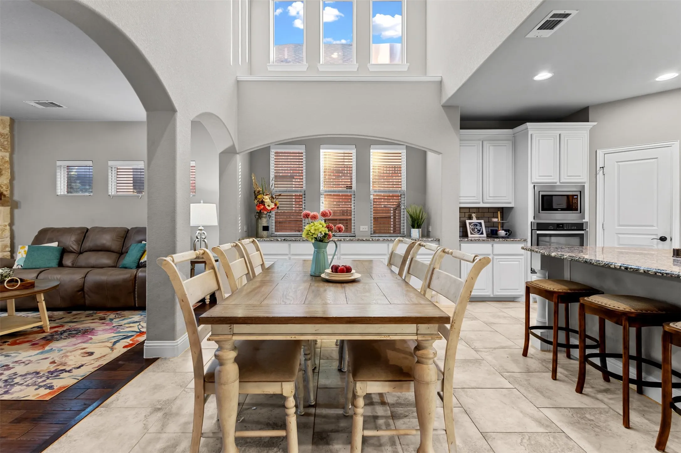 Dining space open to the kitchen and additional living room