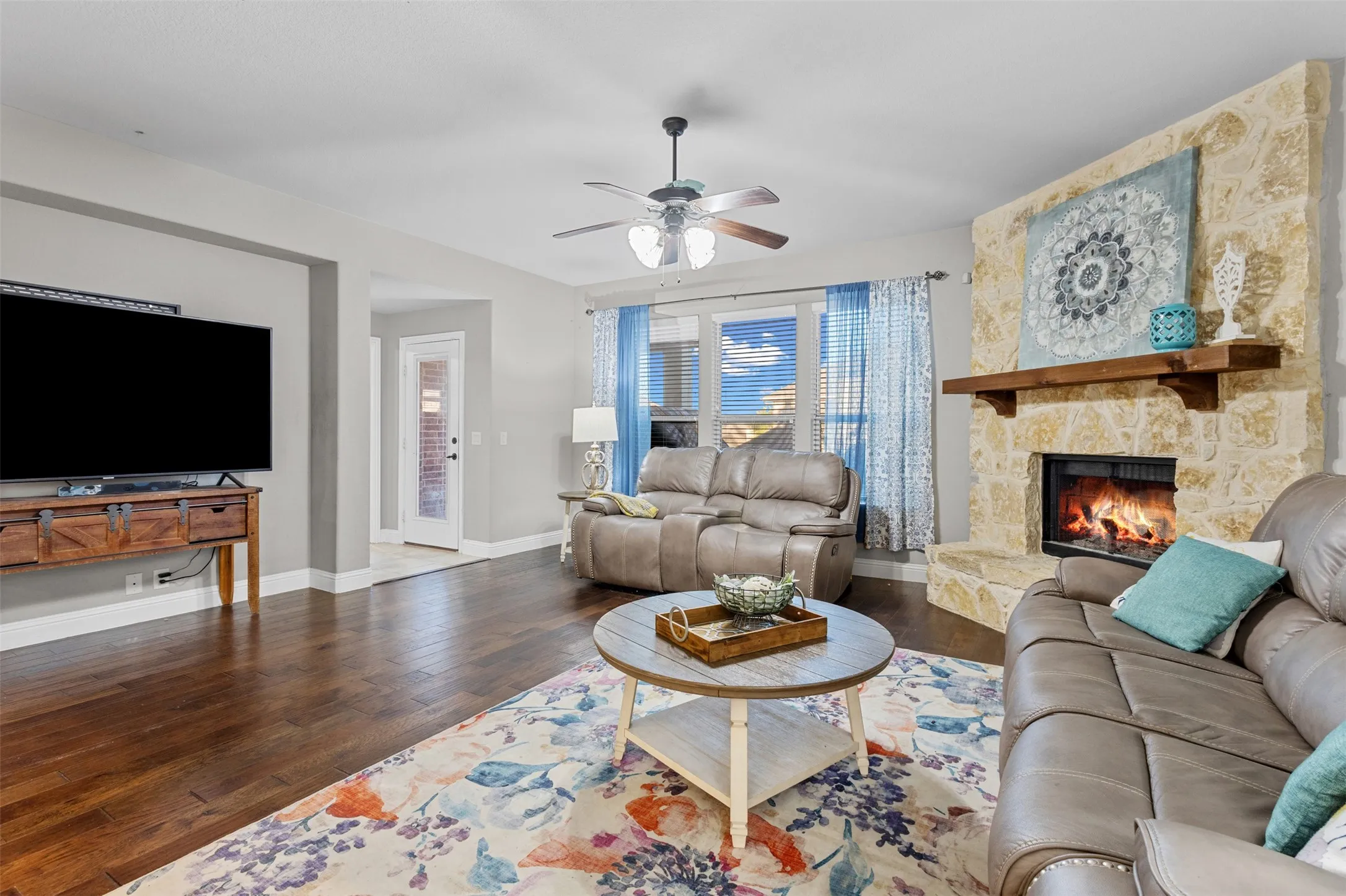 Comfort at its best with a gorgeous stone fireplace