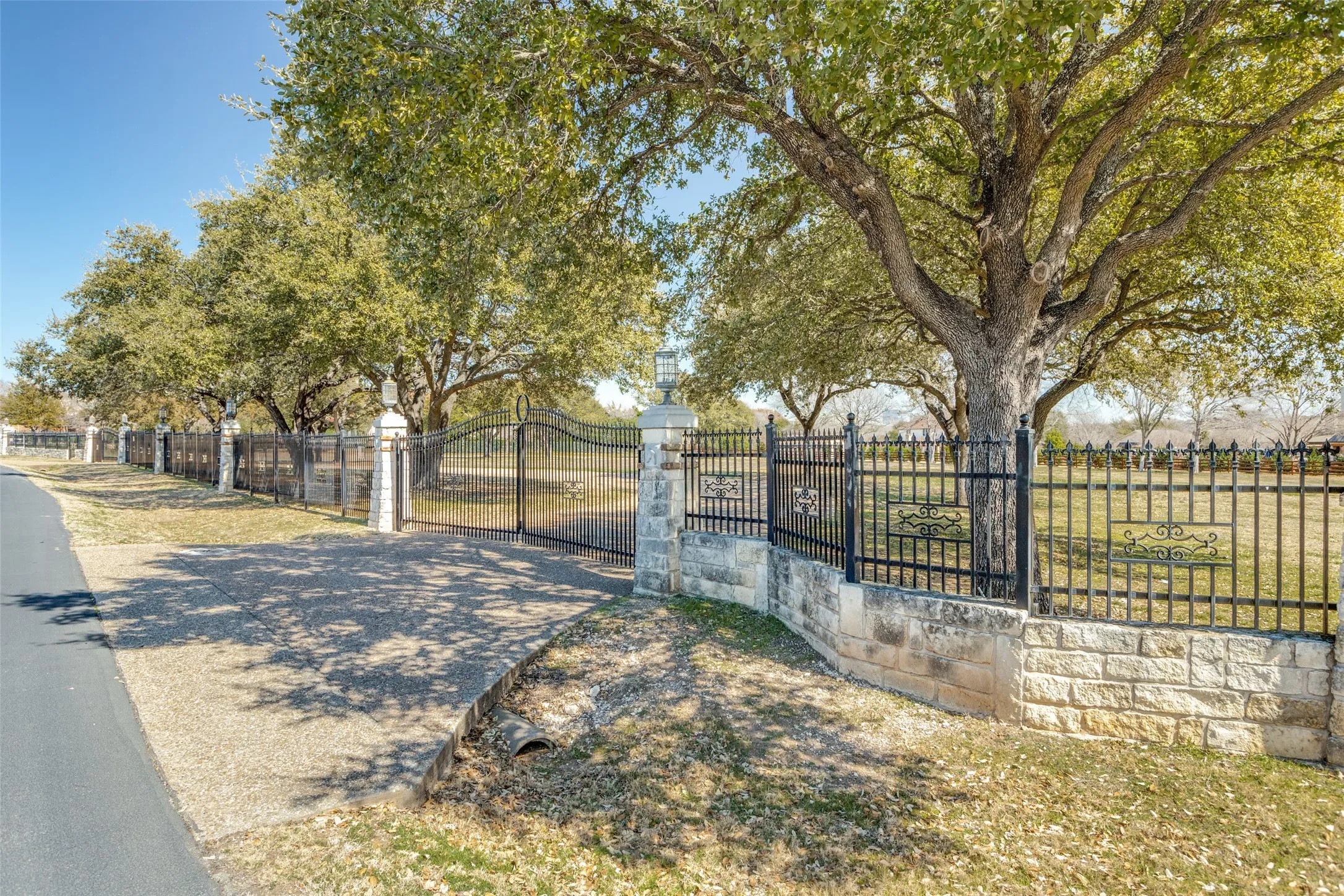 Beautiful iron and stone fence