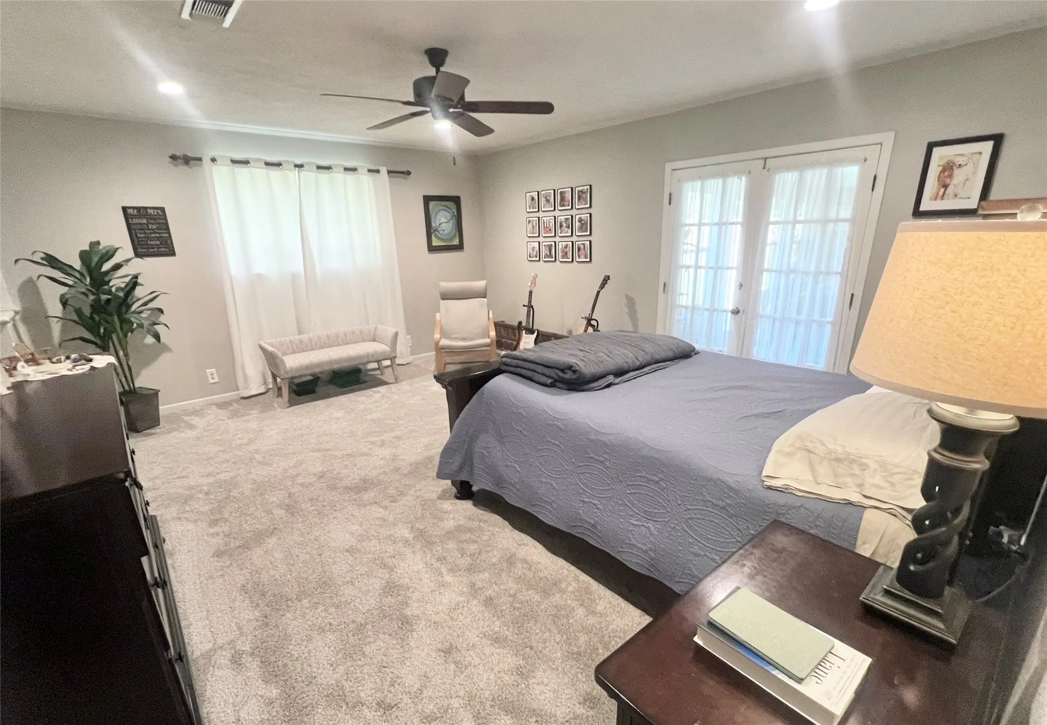 Carpeted bedroom featuring french doors, ceiling fan, and recessed lighting