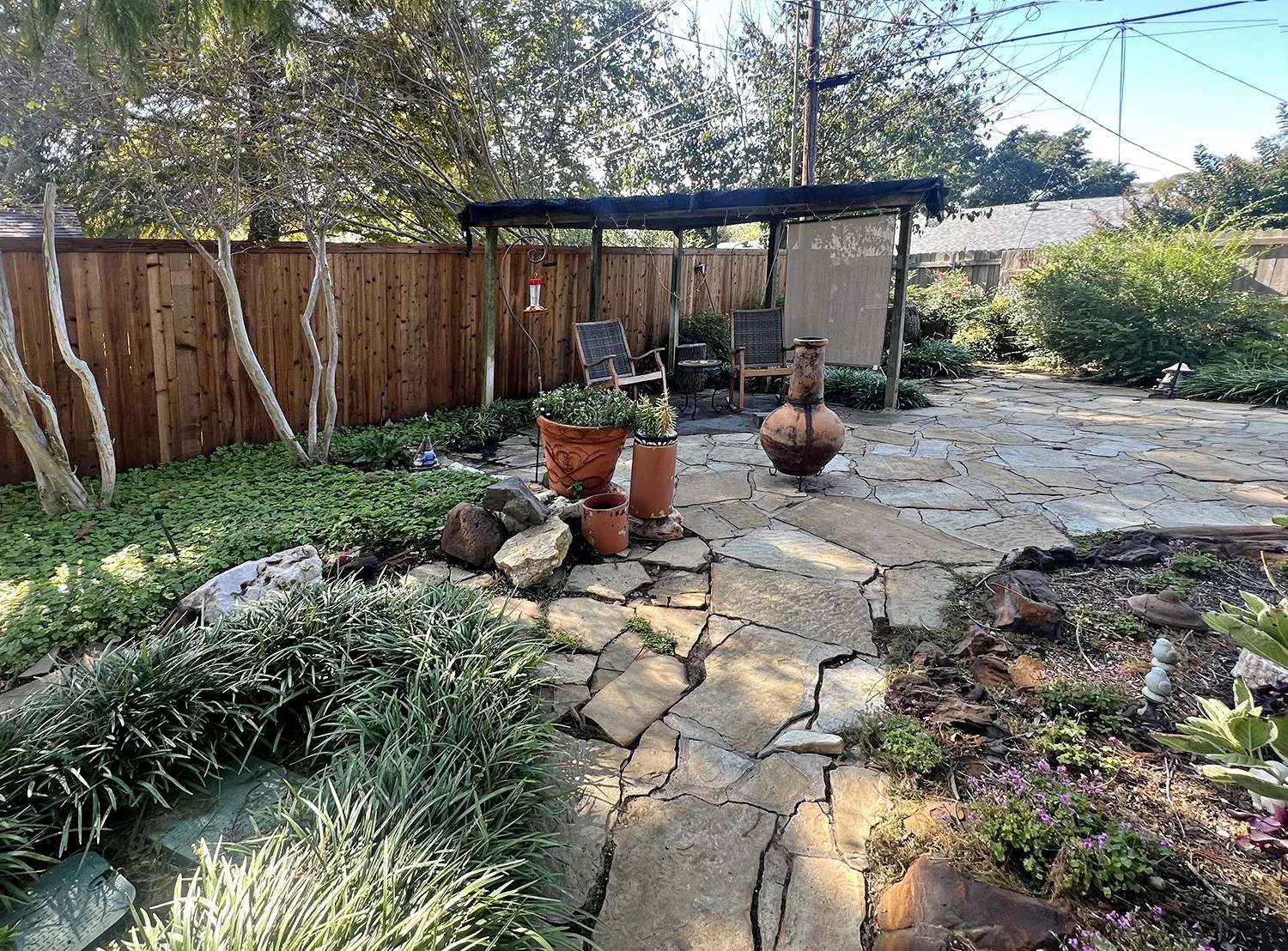 Fenced backyard featuring a patio area