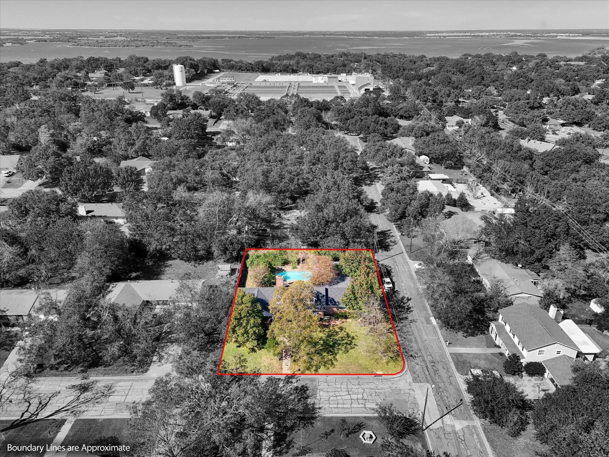 Aerial view of property's location with property parcel outlined