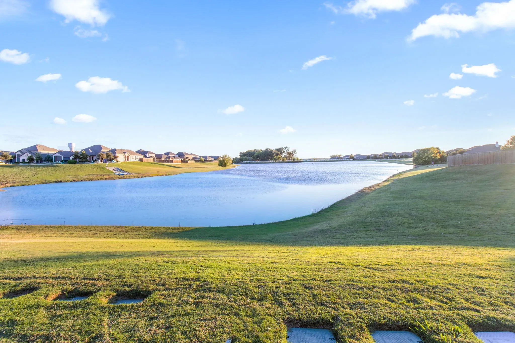 Water view featuring nearby suburban area