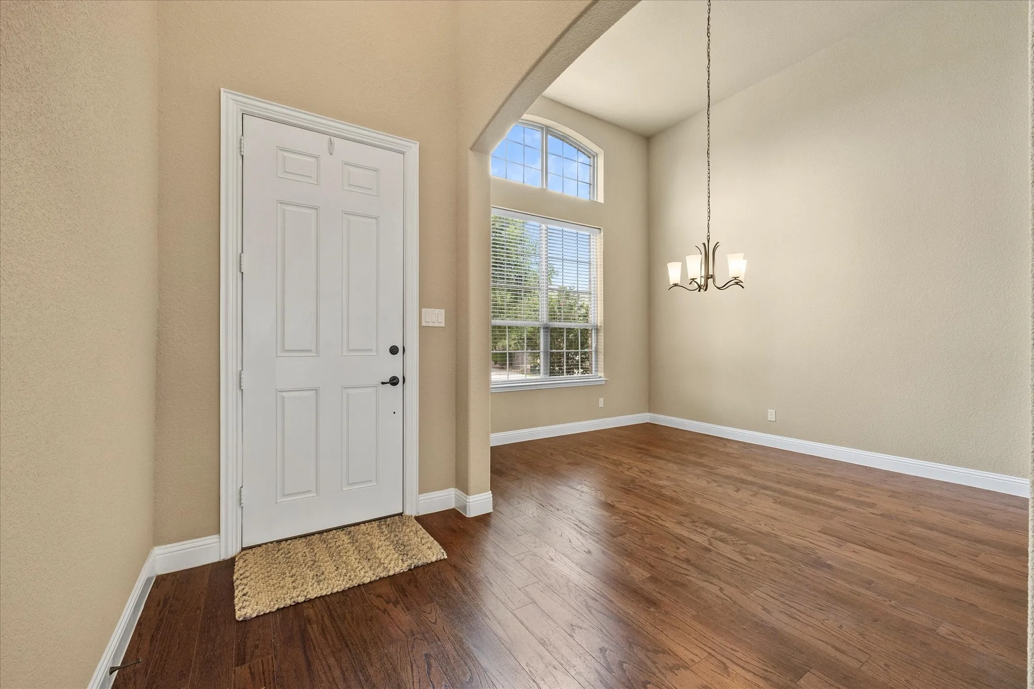 Grand entry opens onto dining area.