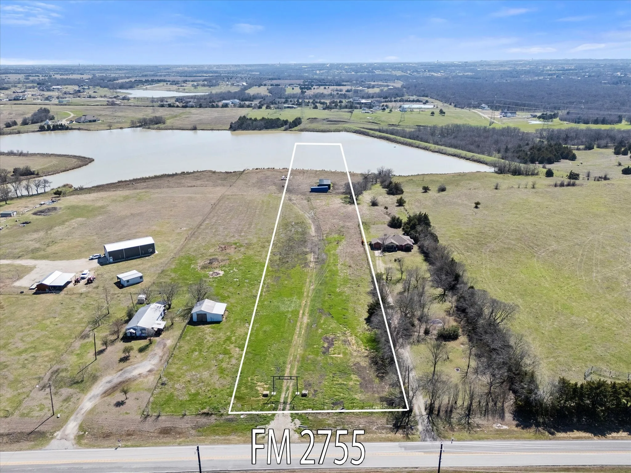 Overview of this exceptional 4 & 1/2 plus acres overlooking lake