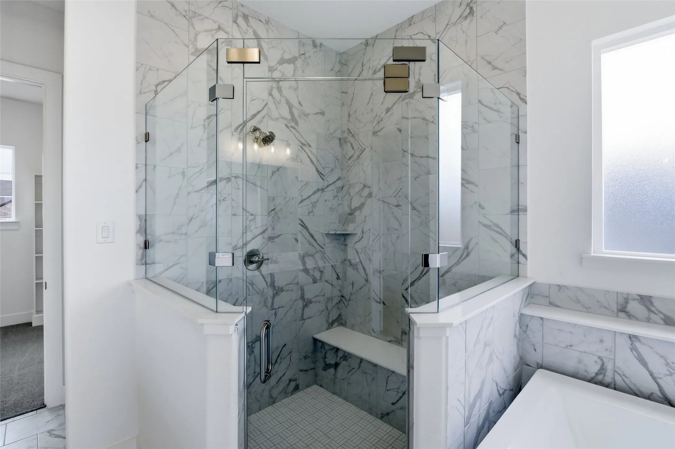 Full bath with a marble finish shower, marble look tile flooring, and a garden tub