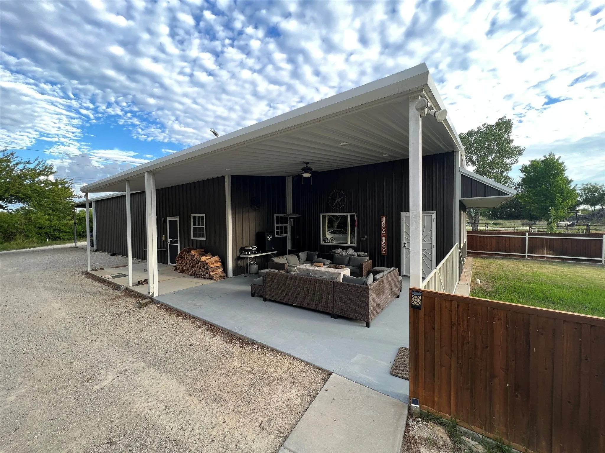 View of patio featuring an outdoor hangout area