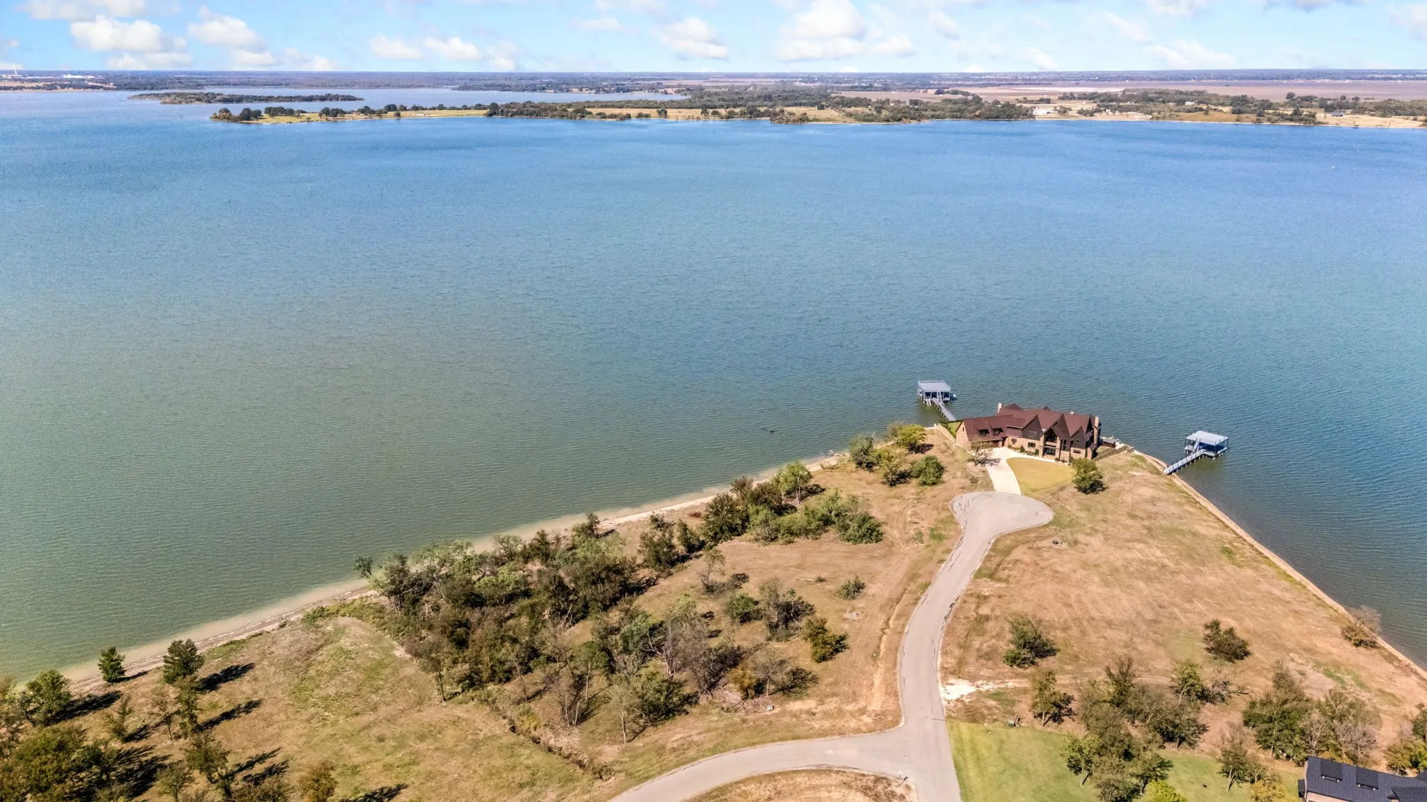 Waterfront lot with bid views of water and amazing sunsets!