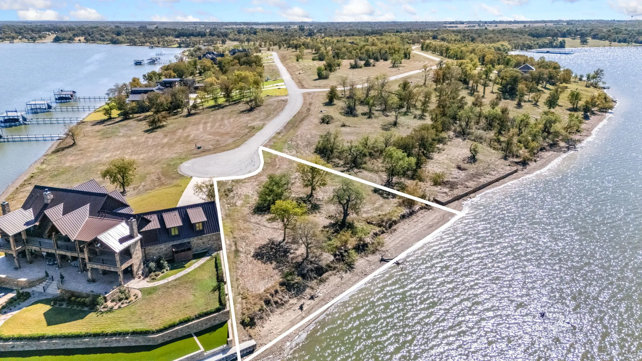 View of property location with a nearby body of water and property boundaries highlighted Boundaries are approximate