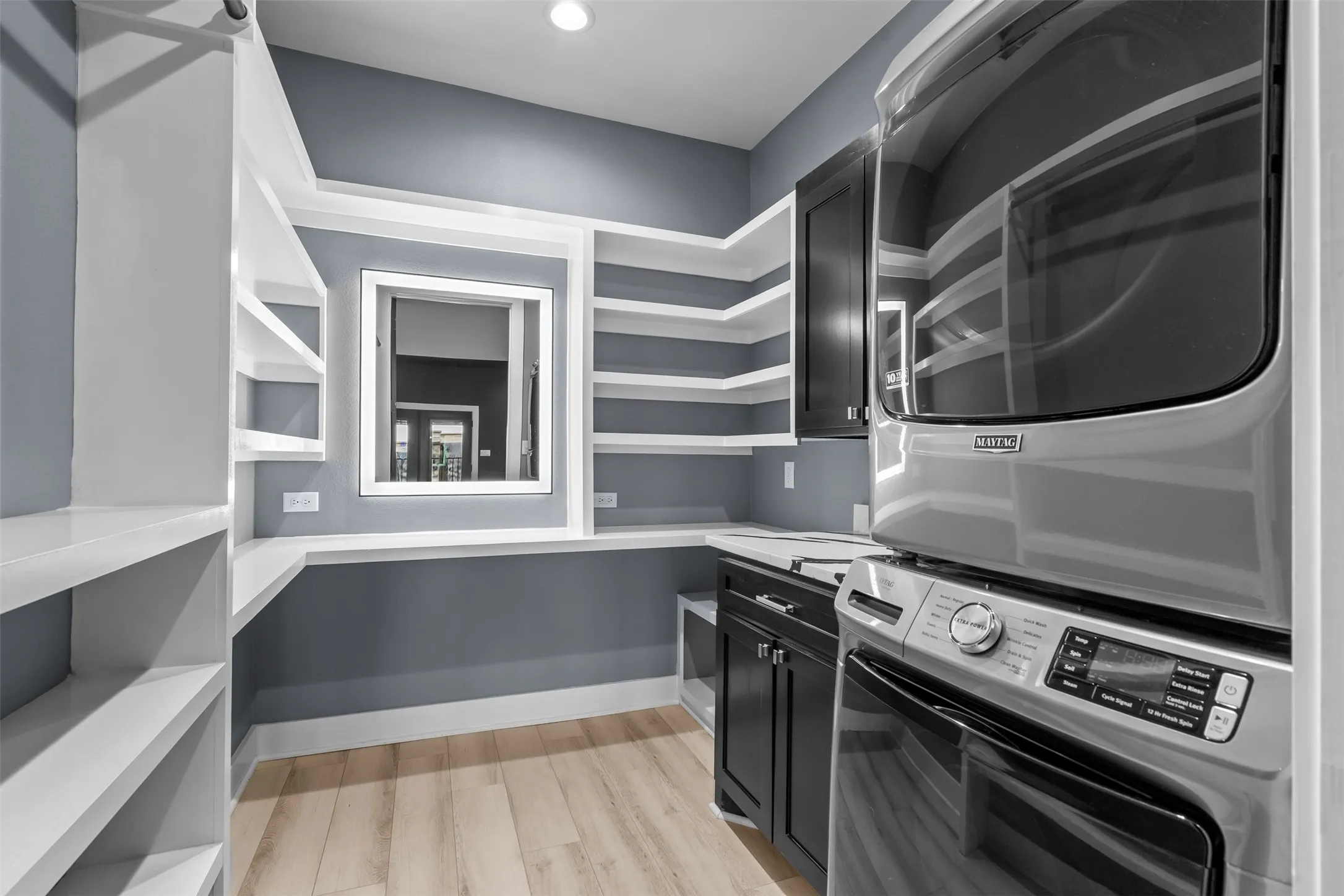 Laundry room in primary bedroom