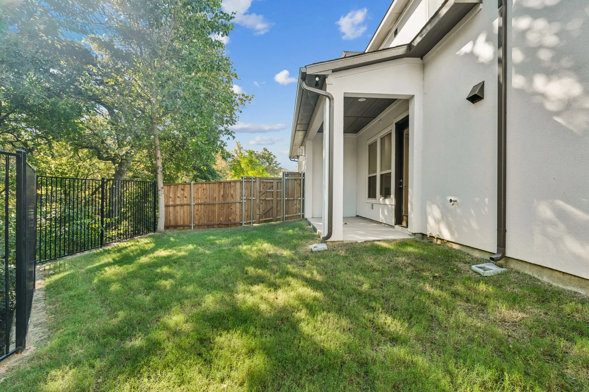 Fenced backyard.