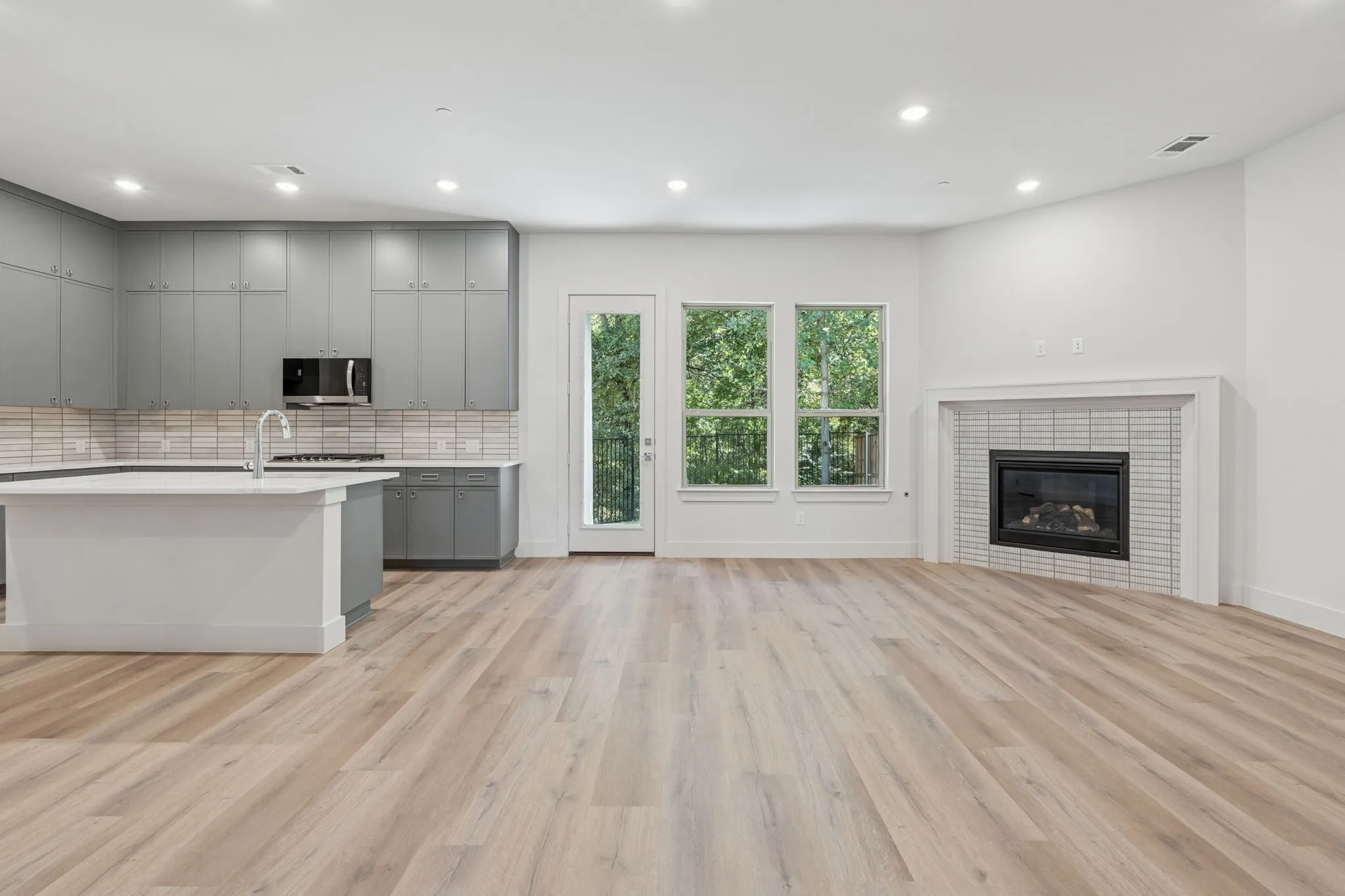 Kitchen and living room views.