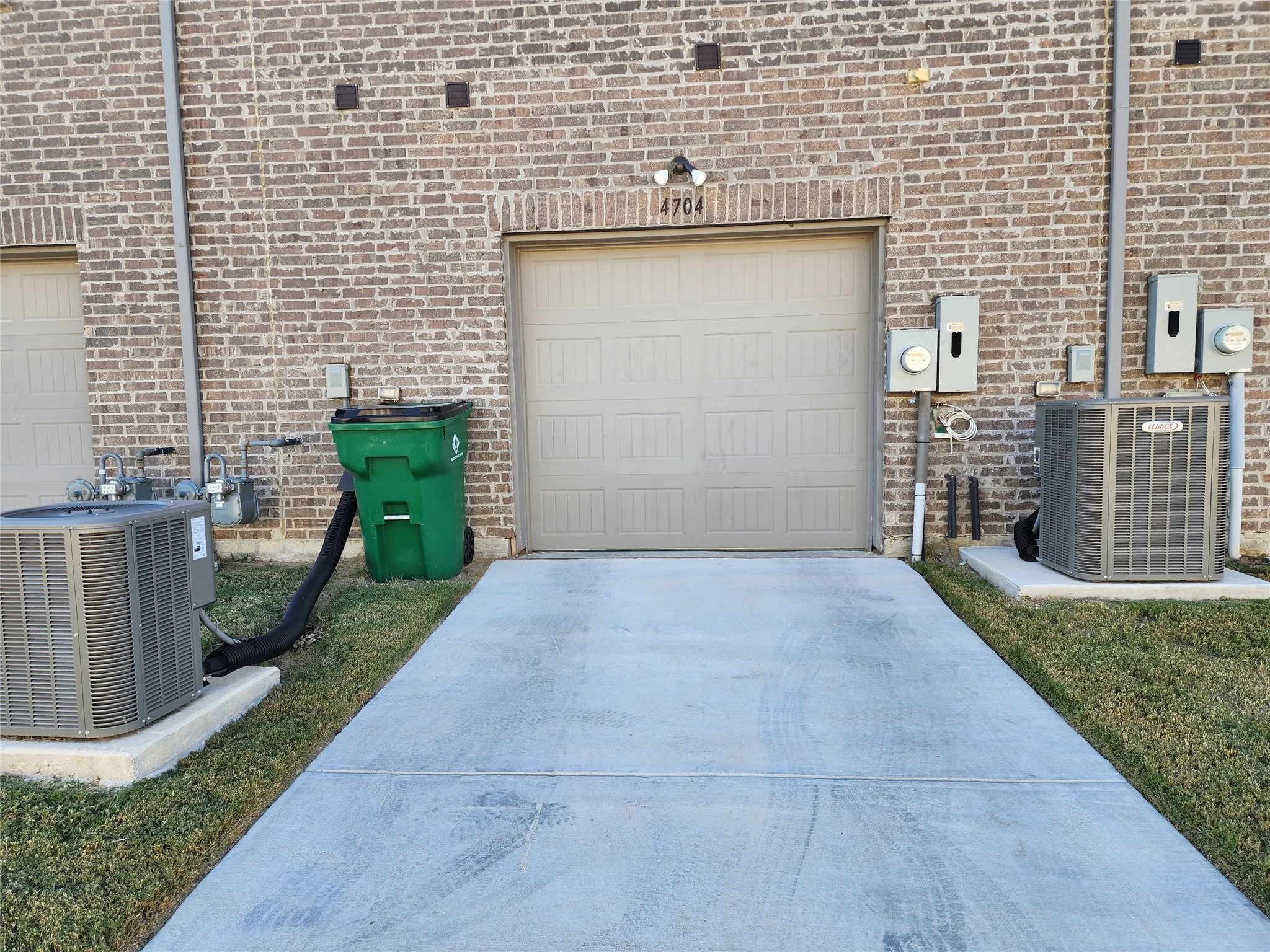 Garage with concrete driveway