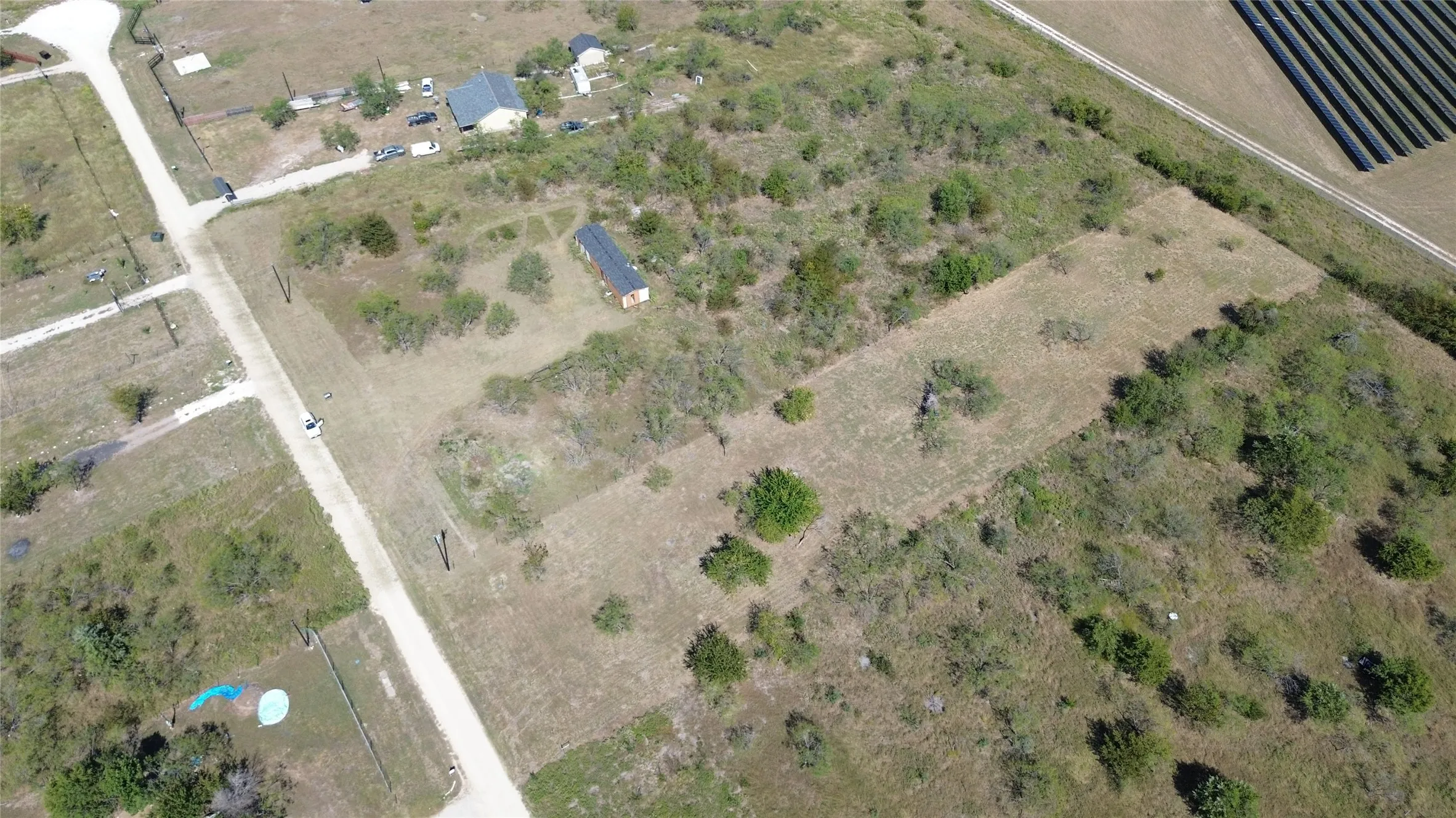Aerial overview of property's location with rural landscape