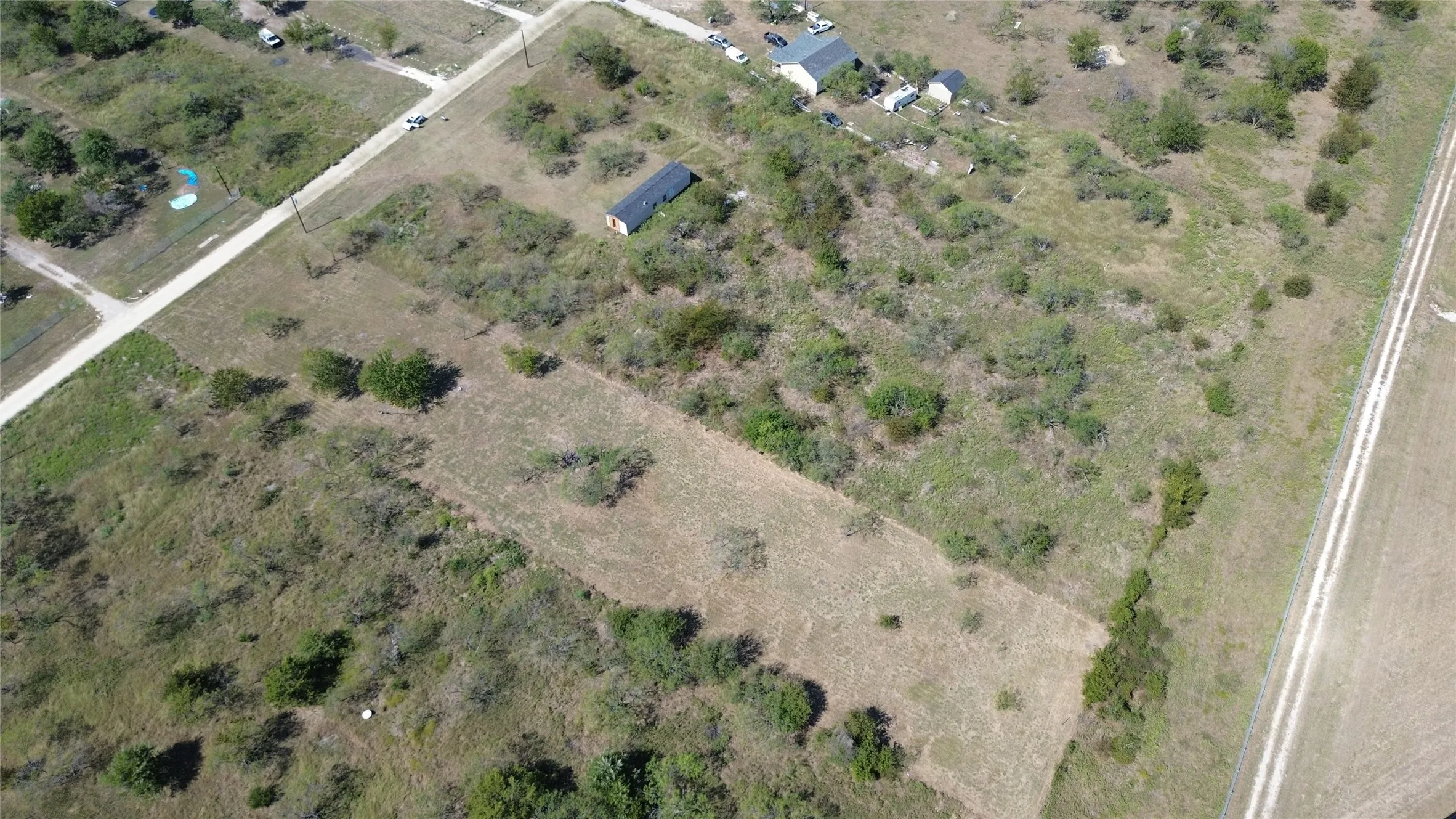 Aerial overview of property's location featuring rural landscape