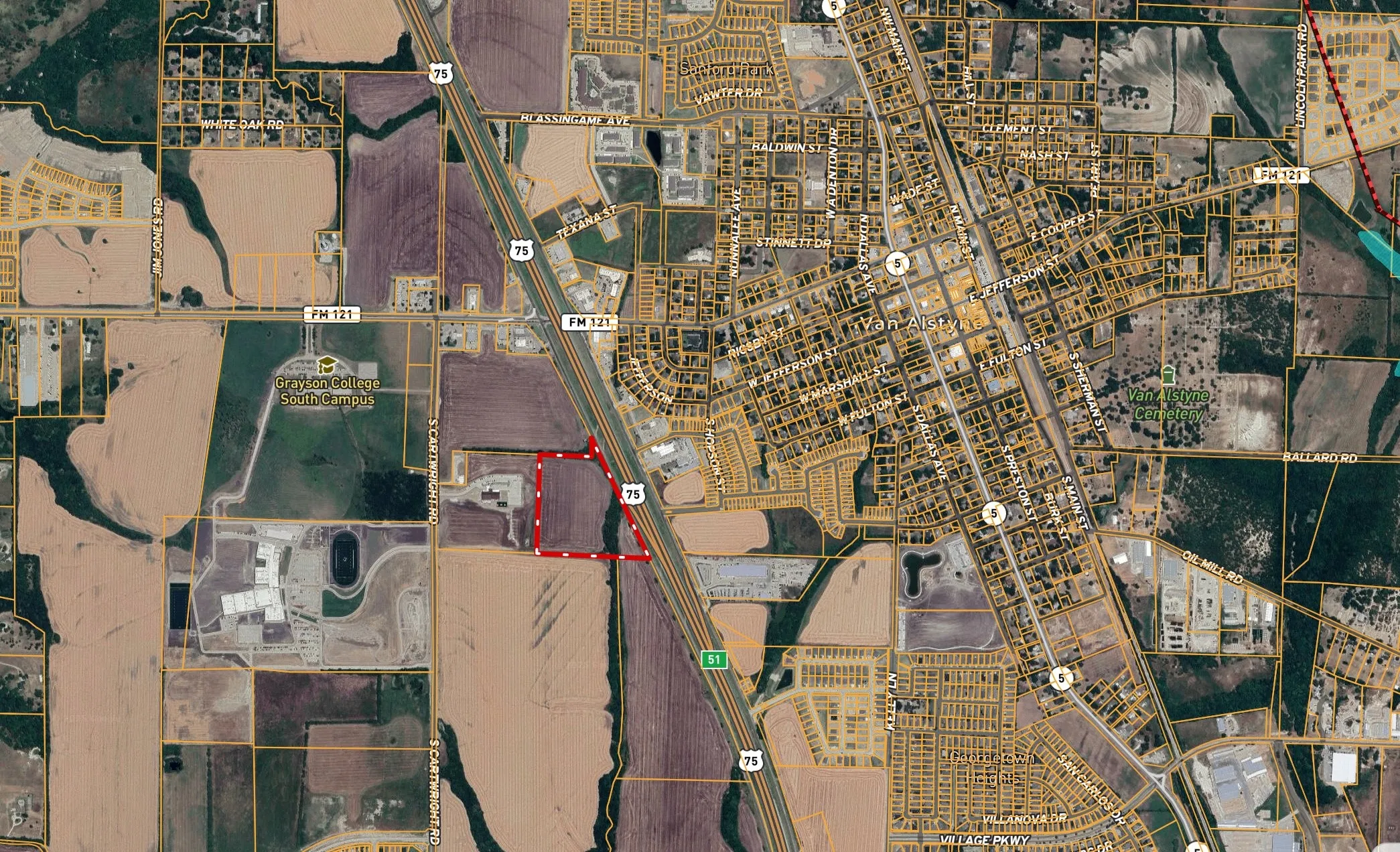 Aerial map of property and surrounding area featuring property boundaries highlighted