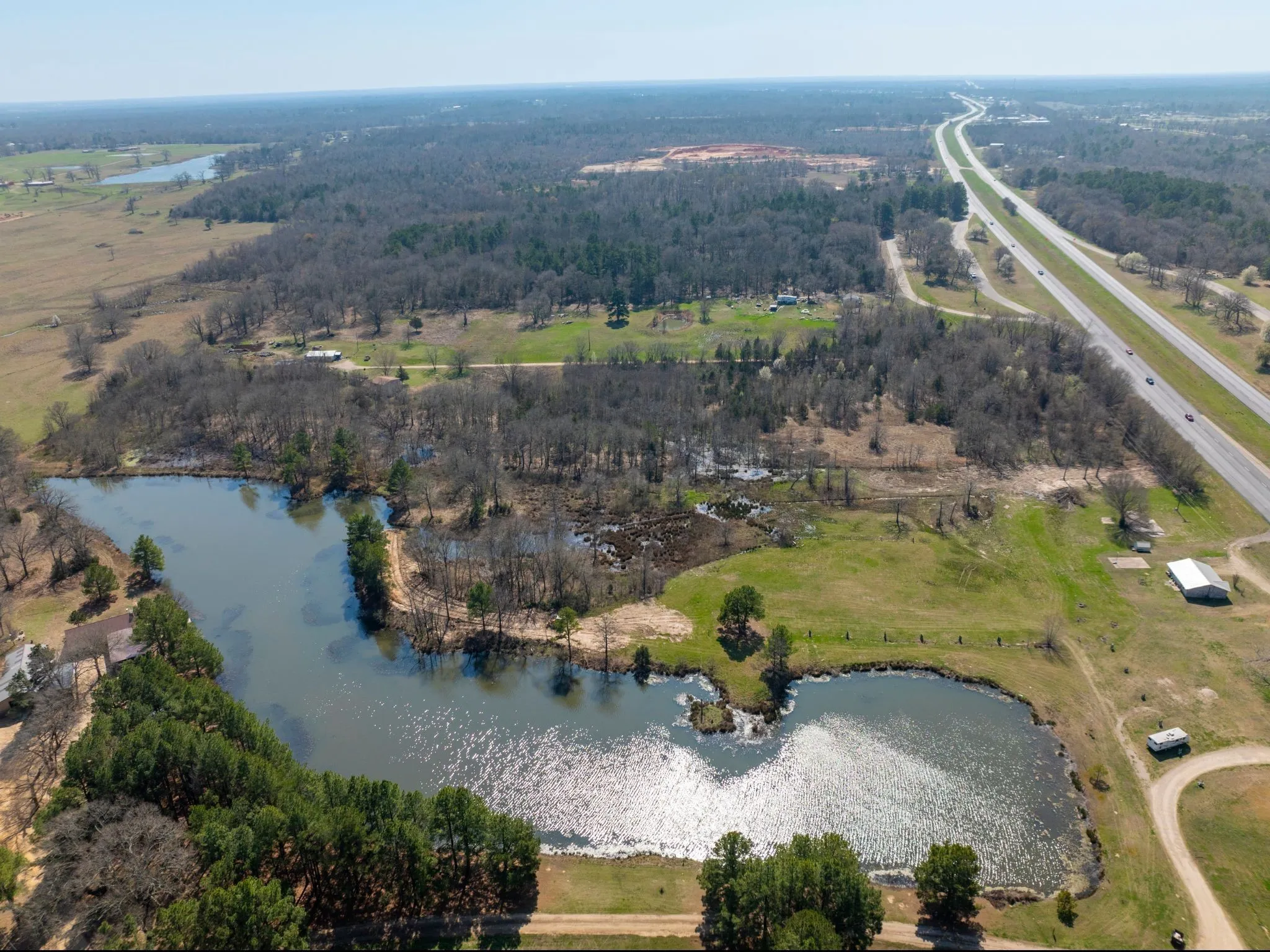 View of property location with a nearby body of water
