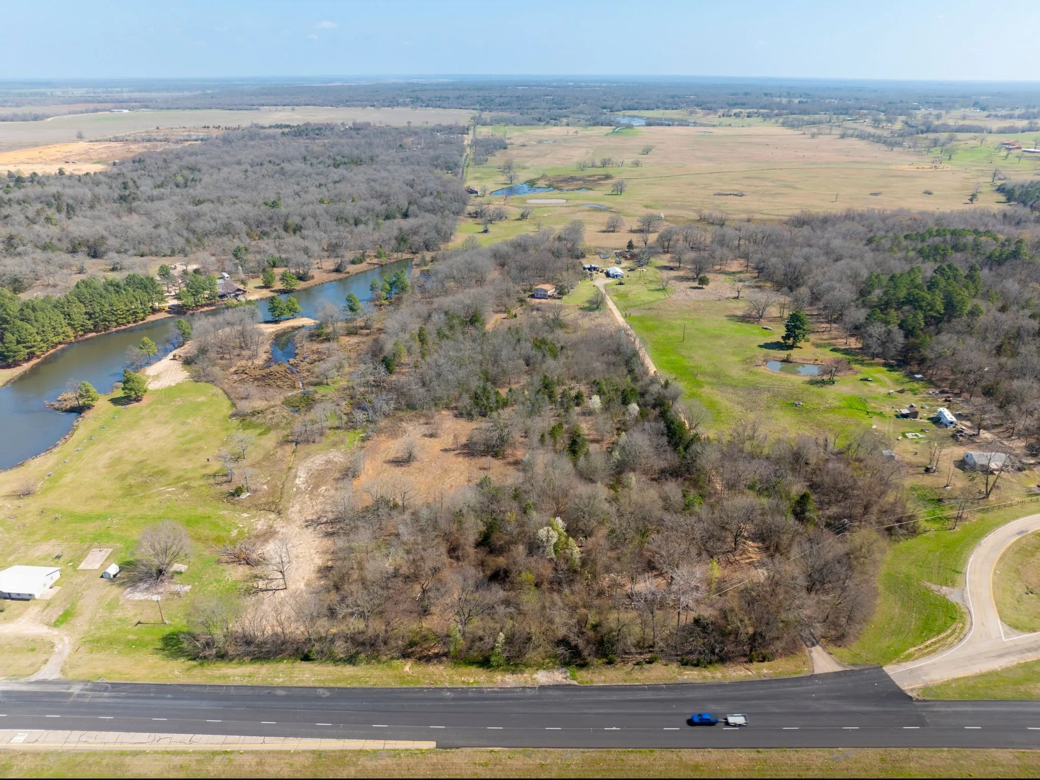 View of property location with a large body of water and rural landscape
